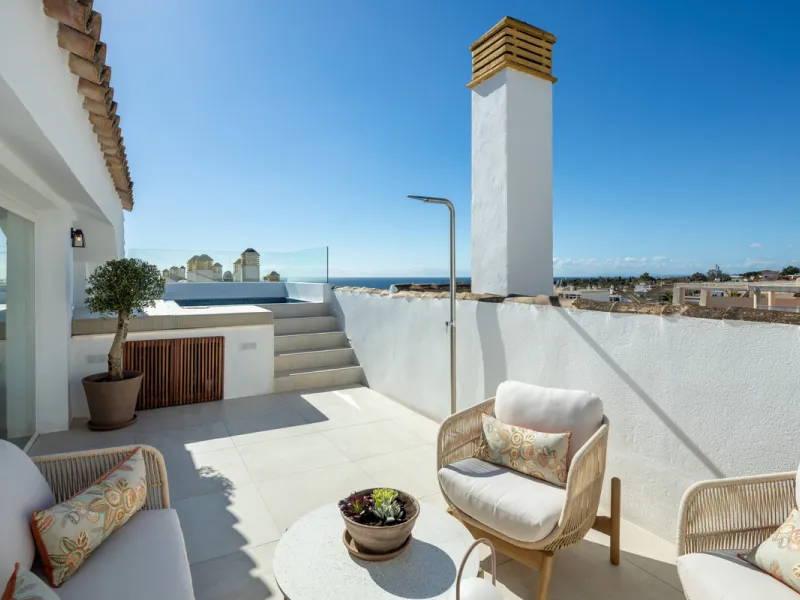 Located in the sought-after area of the Marbella Golden Mile, Costa PH is an exceptional duplex penthouse offering panoramic sea and mountain views. Designed with a modern open-plan layout, the living, dining, and kitchen areas are seamlessly connected, c