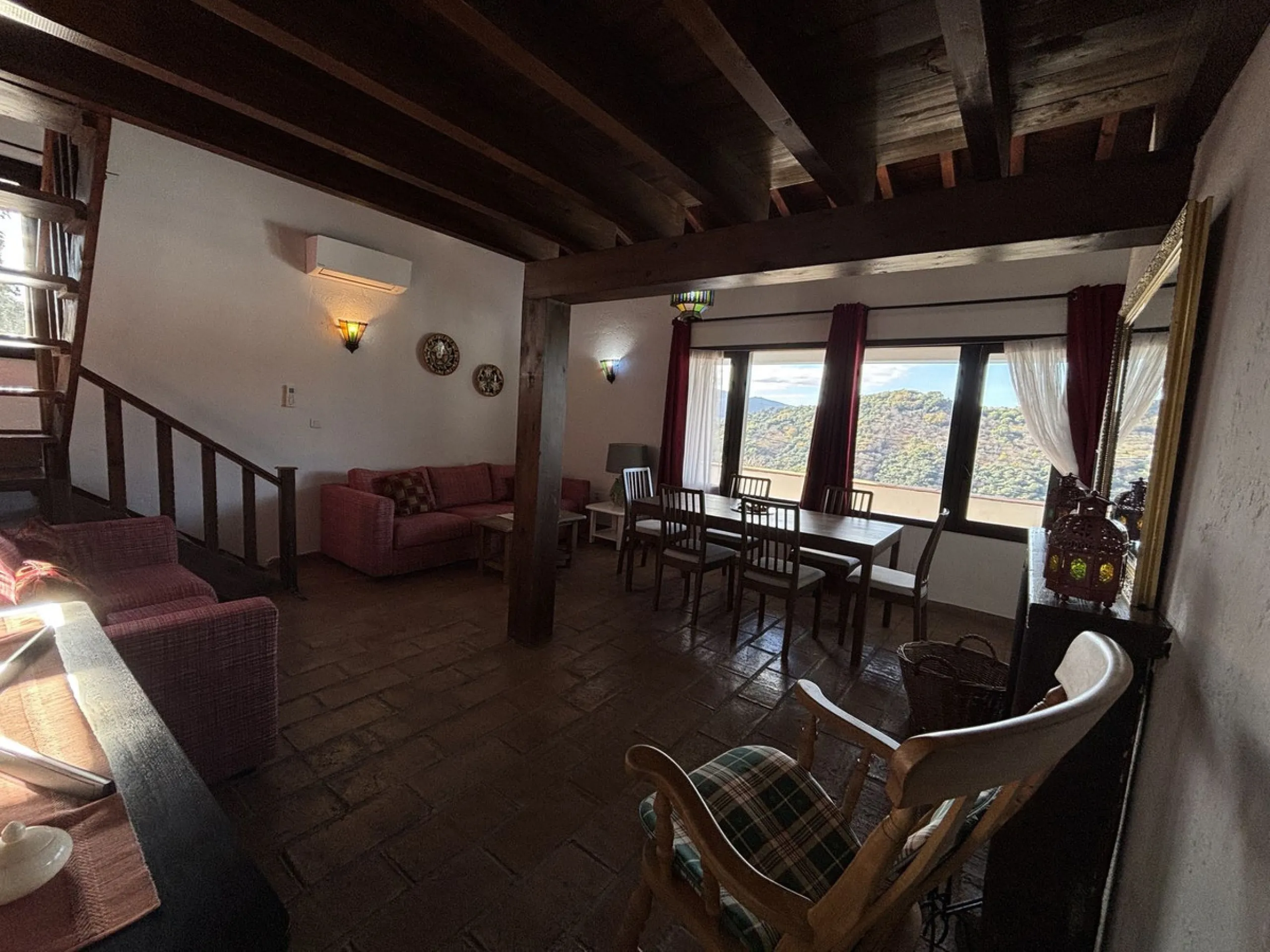 Income potential meets lifestyle in this exceptional multi-unit casa rural on the very edge of Júzcar (Málaga), enjoying breathtaking open views and a wonderfully tranquil setting at the edge of the village. Set on approximately 8,900 m² of land, the prop