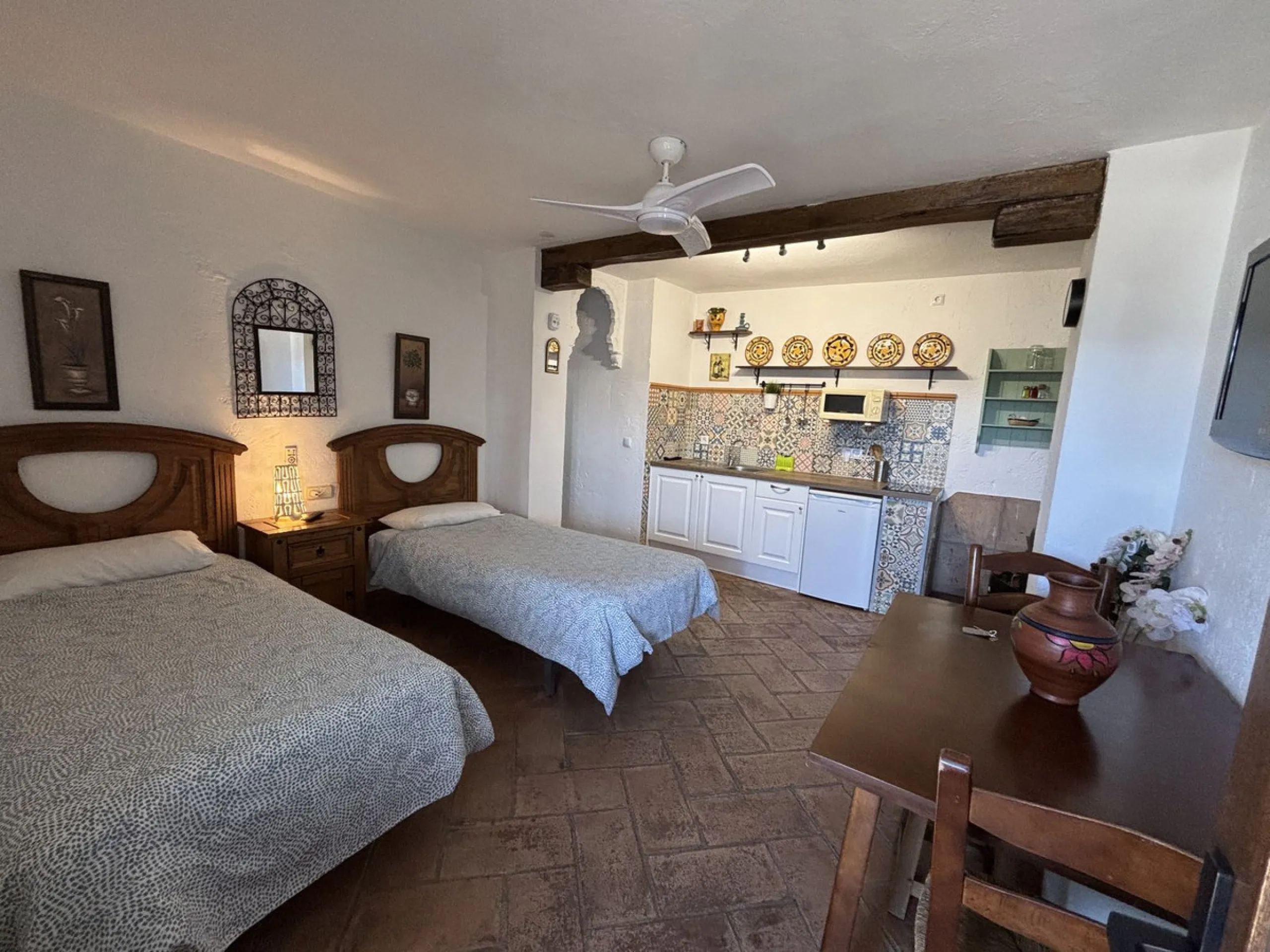 Income potential meets lifestyle in this exceptional multi-unit casa rural on the very edge of Júzcar (Málaga), enjoying breathtaking open views and a wonderfully tranquil setting at the edge of the village. Set on approximately 8,900 m² of land, the prop