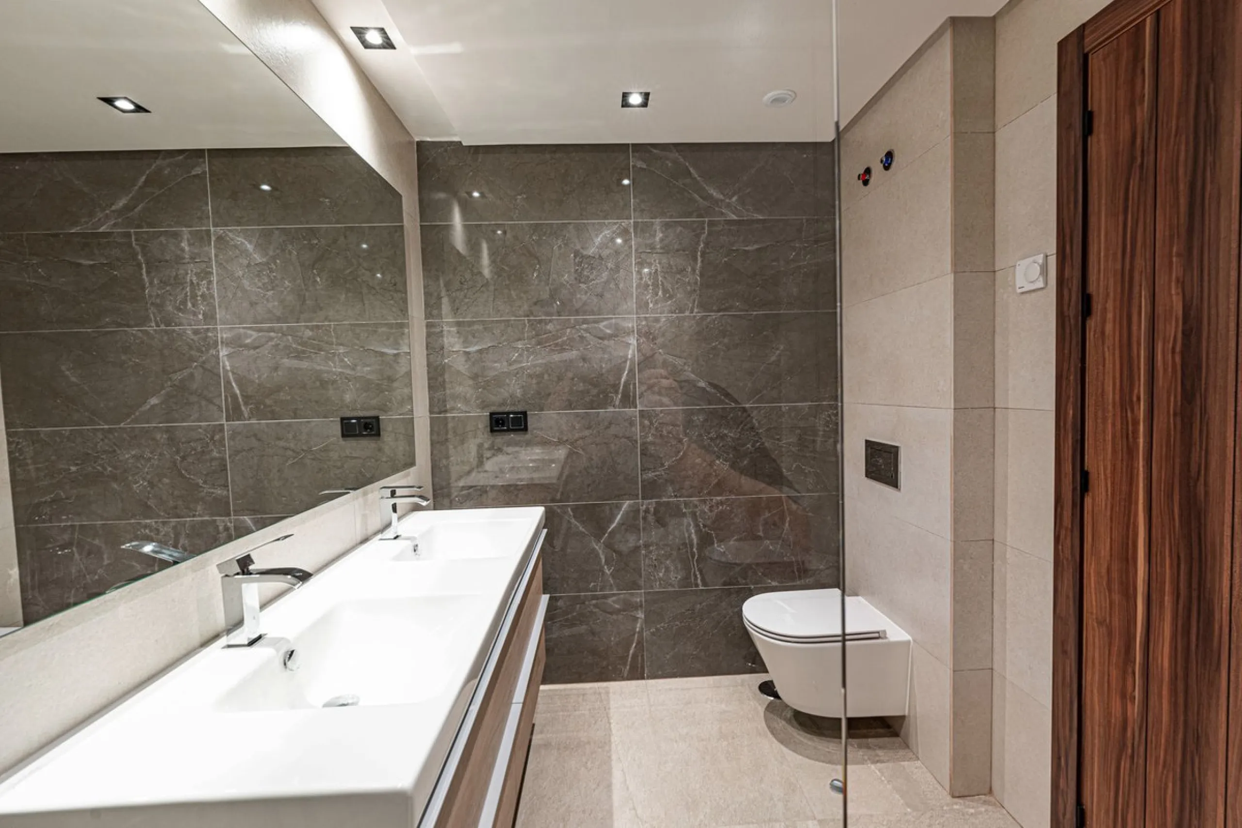 Superb Elevated Corner 3-Bedoom 2-bath Contemporary Apartment with 2 separate balconies set within the sought-after Marbella Lake Development in the Golf Valley.