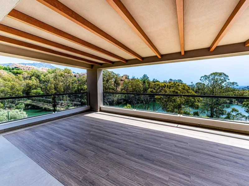 Superb Elevated Corner 3-Bedoom 2-bath Contemporary Apartment with 2 separate balconies set within the sought-after Marbella Lake Development in the Golf Valley.