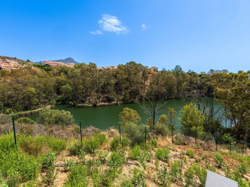 Superb Elevated Corner 3-Bedoom 2-bath Contemporary Apartment with 2 separate balconies set within the sought-after Marbella Lake Development in the Golf Valley.