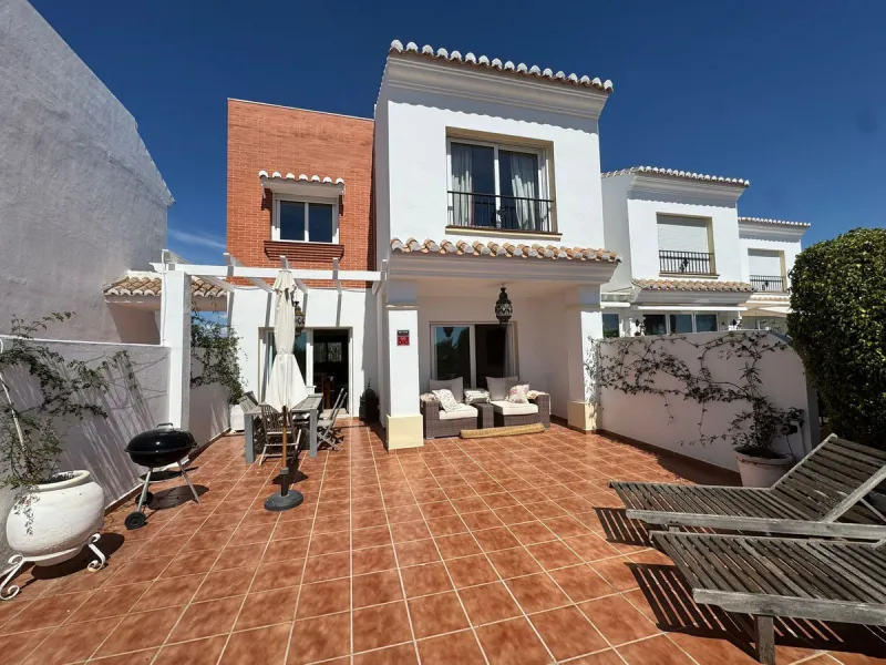 Townhouse , located in the prestigious El Chaparral la cala  The property is arranged into various rooms and service areas, and includes an exclusive-use garden area.