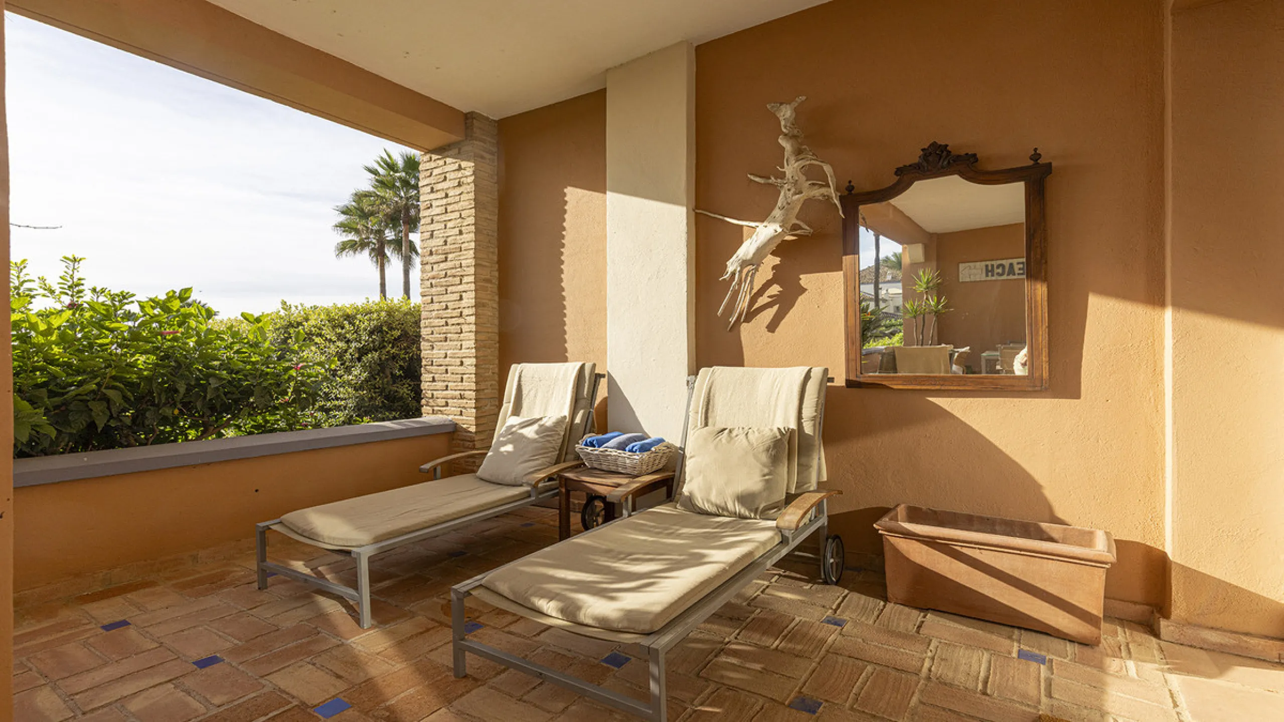 Wake up to breathtaking sea views from this exceptional 3-bedroom, 2-bathroom ground floor apartment set within one of the most prestigious frontline beach urbanisations in Casares Costa. With a spacious terrace overlooking beautifully landscaped gardens 