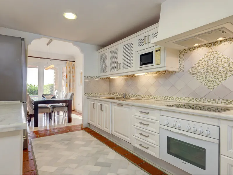 Wake up to breathtaking sea views from this exceptional 3-bedroom, 2-bathroom ground floor apartment set within one of the most prestigious frontline beach urbanisations in Casares Costa. With a spacious terrace overlooking beautifully landscaped gardens 