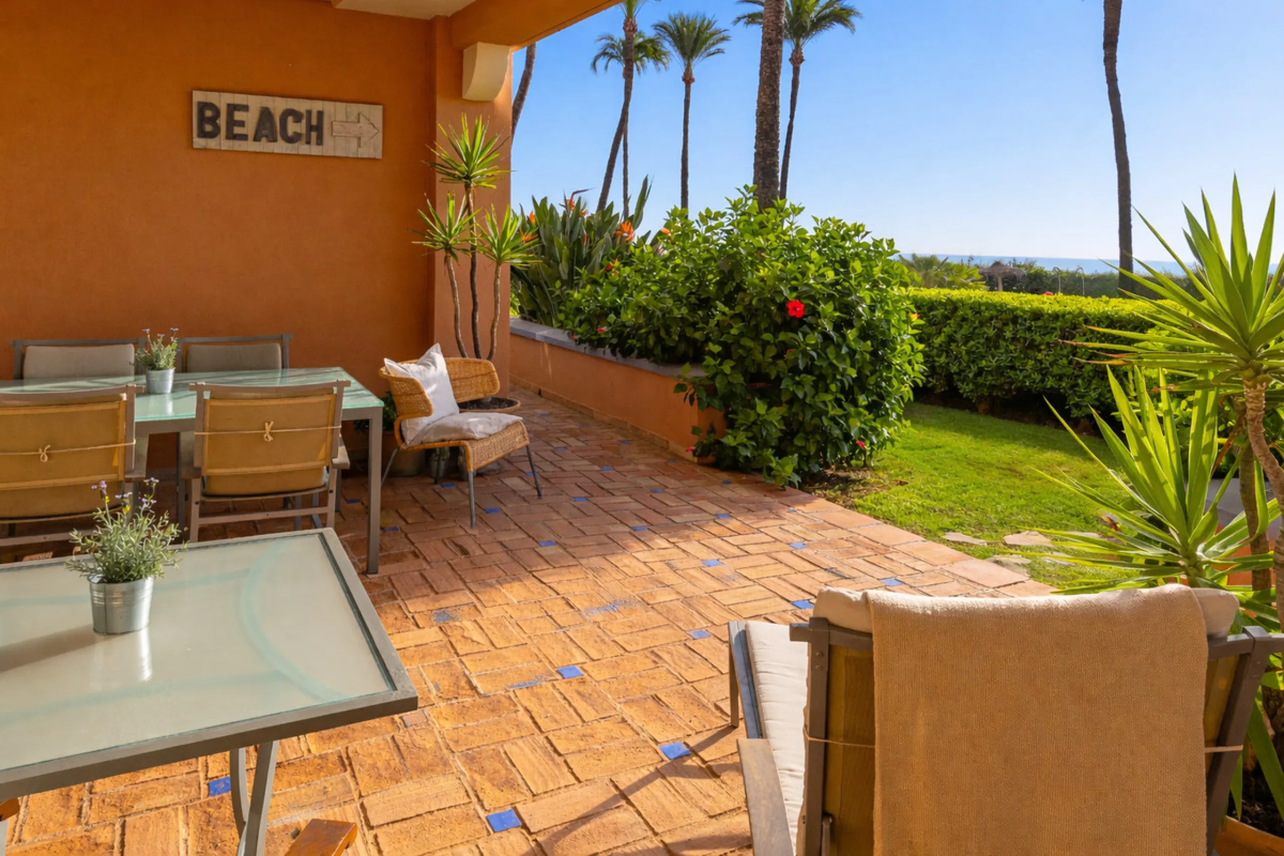 Wake up to breathtaking sea views from this exceptional 3-bedroom, 2-bathroom ground floor apartment set within one of the most prestigious frontline beach urbanisations in Casares Costa. With a spacious terrace overlooking beautifully landscaped gardens 
