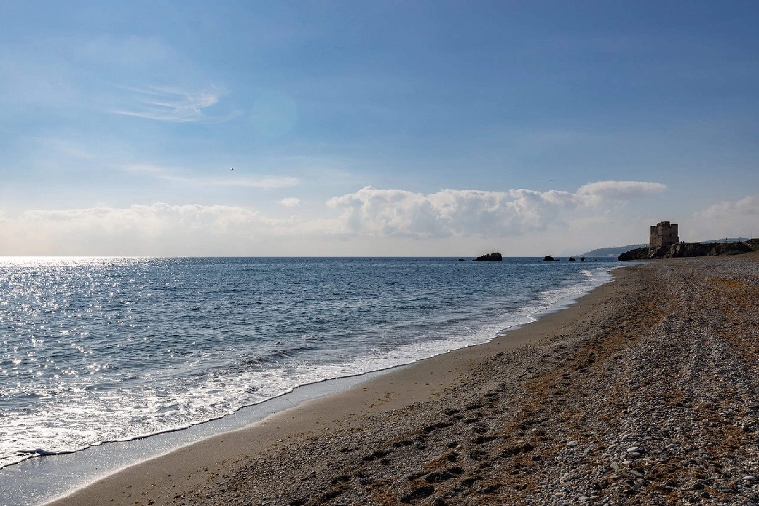 Wake up to breathtaking sea views from this exceptional 3-bedroom, 2-bathroom ground floor apartment set within one of the most prestigious frontline beach urbanisations in Casares Costa. With a spacious terrace overlooking beautifully landscaped gardens 