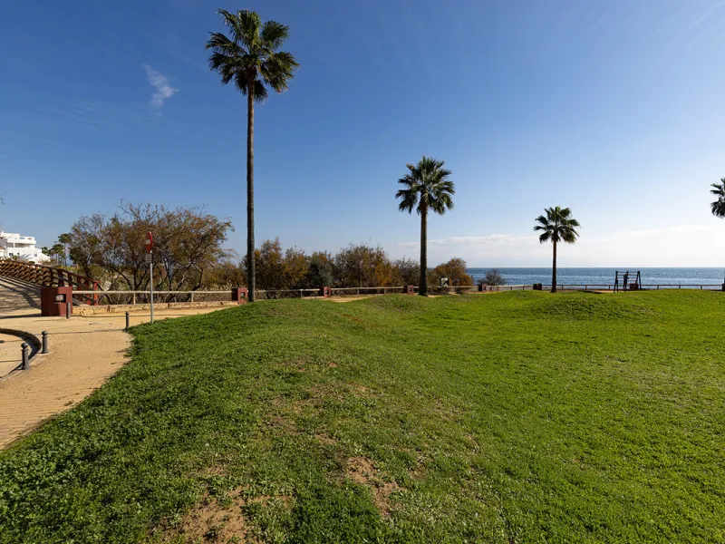 Wake up to breathtaking sea views from this exceptional 3-bedroom, 2-bathroom ground floor apartment set within one of the most prestigious frontline beach urbanisations in Casares Costa. With a spacious terrace overlooking beautifully landscaped gardens 