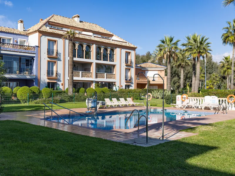 Wake up to breathtaking sea views from this exceptional 3-bedroom, 2-bathroom ground floor apartment set within one of the most prestigious frontline beach urbanisations in Casares Costa. With a spacious terrace overlooking beautifully landscaped gardens 