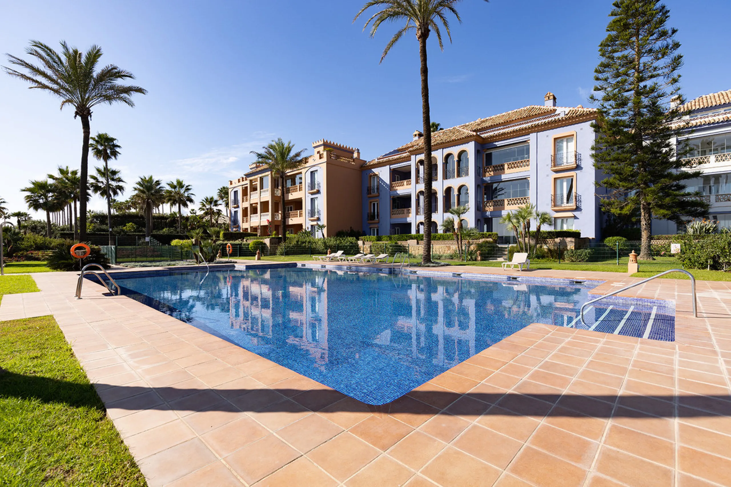 Wake up to breathtaking sea views from this exceptional 3-bedroom, 2-bathroom ground floor apartment set within one of the most prestigious frontline beach urbanisations in Casares Costa. With a spacious terrace overlooking beautifully landscaped gardens 