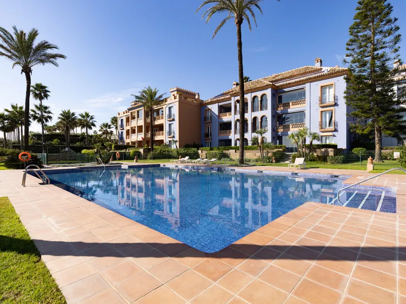 Wake up to breathtaking sea views from this exceptional 3-bedroom, 2-bathroom ground floor apartment set within one of the most prestigious frontline beach urbanisations in Casares Costa. With a spacious terrace overlooking beautifully landscaped gardens 