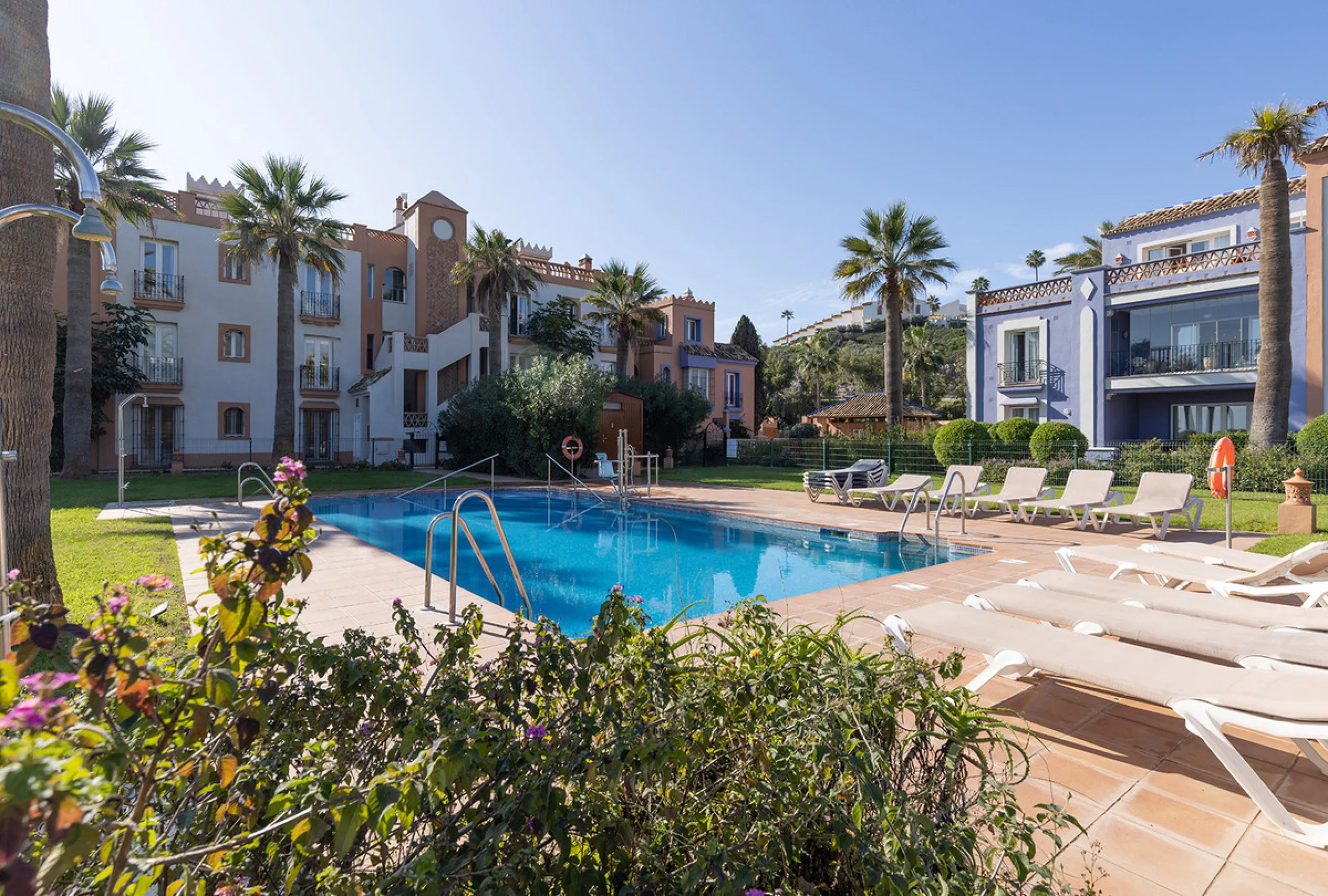Wake up to breathtaking sea views from this exceptional 3-bedroom, 2-bathroom ground floor apartment set within one of the most prestigious frontline beach urbanisations in Casares Costa. With a spacious terrace overlooking beautifully landscaped gardens 