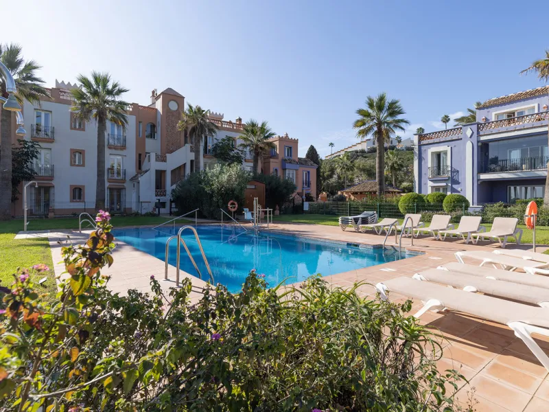 Wake up to breathtaking sea views from this exceptional 3-bedroom, 2-bathroom ground floor apartment set within one of the most prestigious frontline beach urbanisations in Casares Costa. With a spacious terrace overlooking beautifully landscaped gardens 
