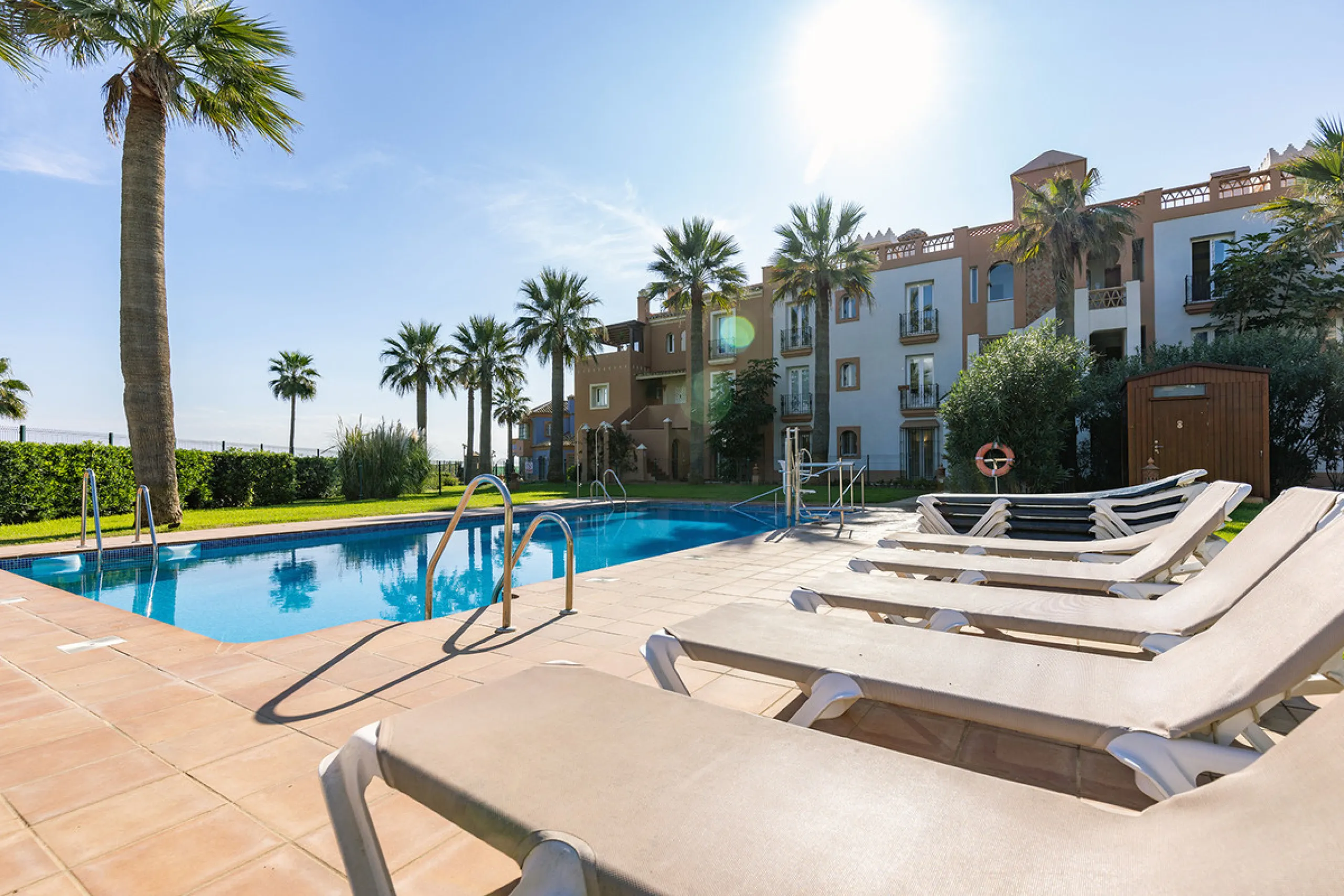 Wake up to breathtaking sea views from this exceptional 3-bedroom, 2-bathroom ground floor apartment set within one of the most prestigious frontline beach urbanisations in Casares Costa. With a spacious terrace overlooking beautifully landscaped gardens 