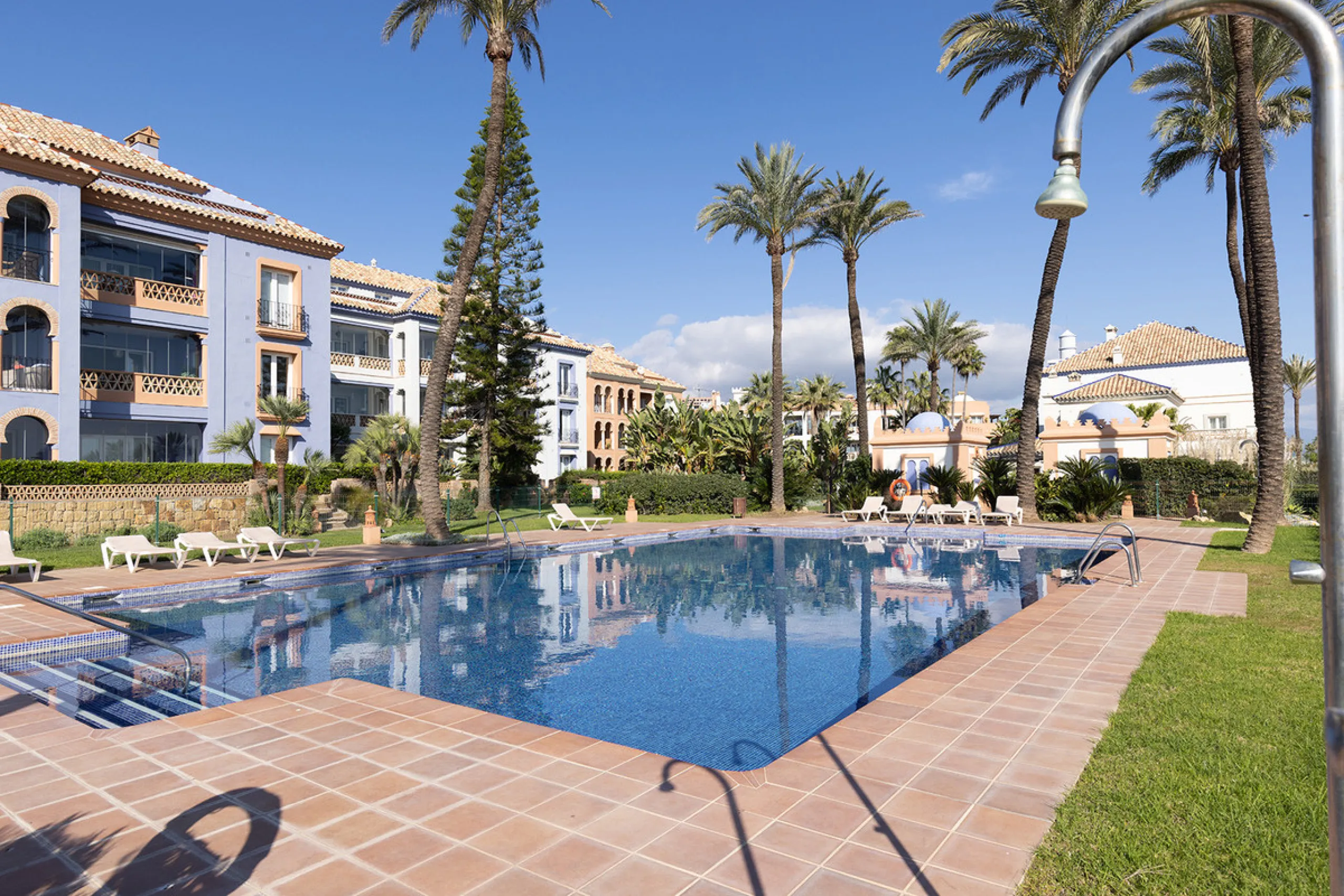 Wake up to breathtaking sea views from this exceptional 3-bedroom, 2-bathroom ground floor apartment set within one of the most prestigious frontline beach urbanisations in Casares Costa. With a spacious terrace overlooking beautifully landscaped gardens 