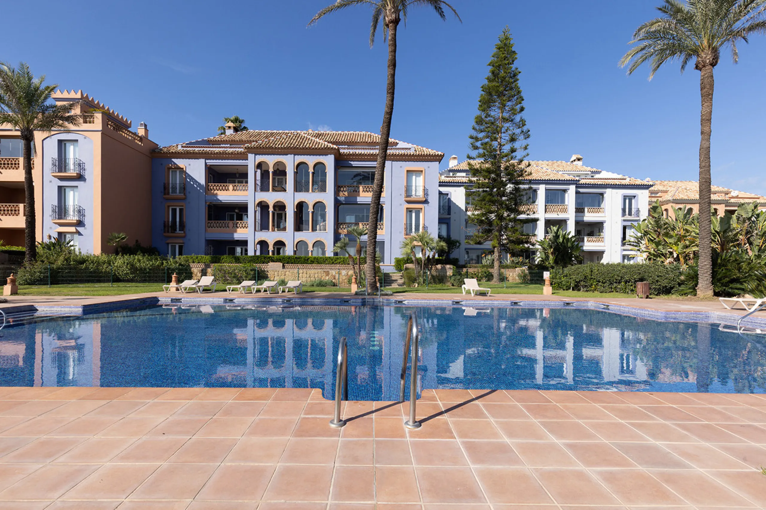 Wake up to breathtaking sea views from this exceptional 3-bedroom, 2-bathroom ground floor apartment set within one of the most prestigious frontline beach urbanisations in Casares Costa. With a spacious terrace overlooking beautifully landscaped gardens 