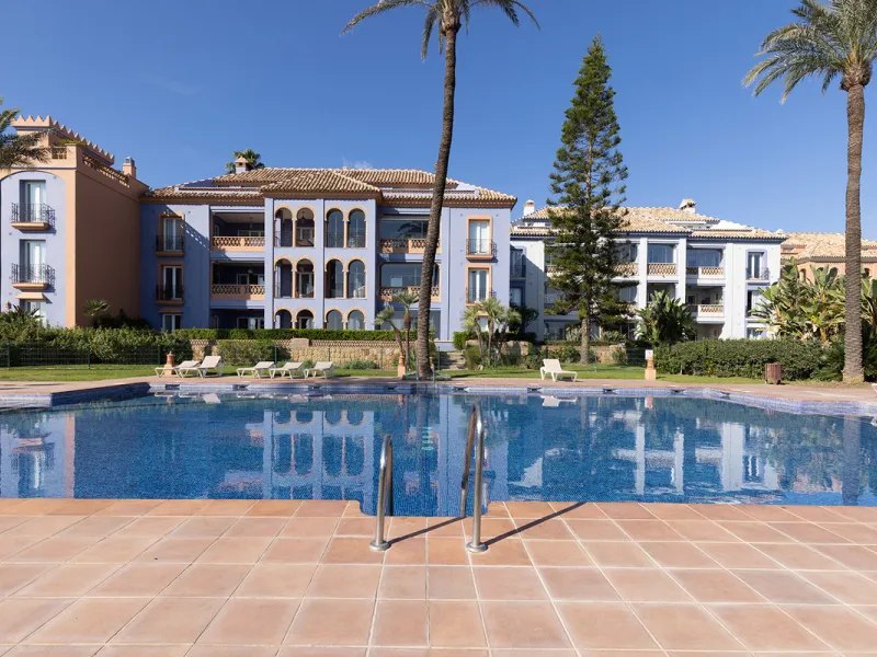 Wake up to breathtaking sea views from this exceptional 3-bedroom, 2-bathroom ground floor apartment set within one of the most prestigious frontline beach urbanisations in Casares Costa. With a spacious terrace overlooking beautifully landscaped gardens 