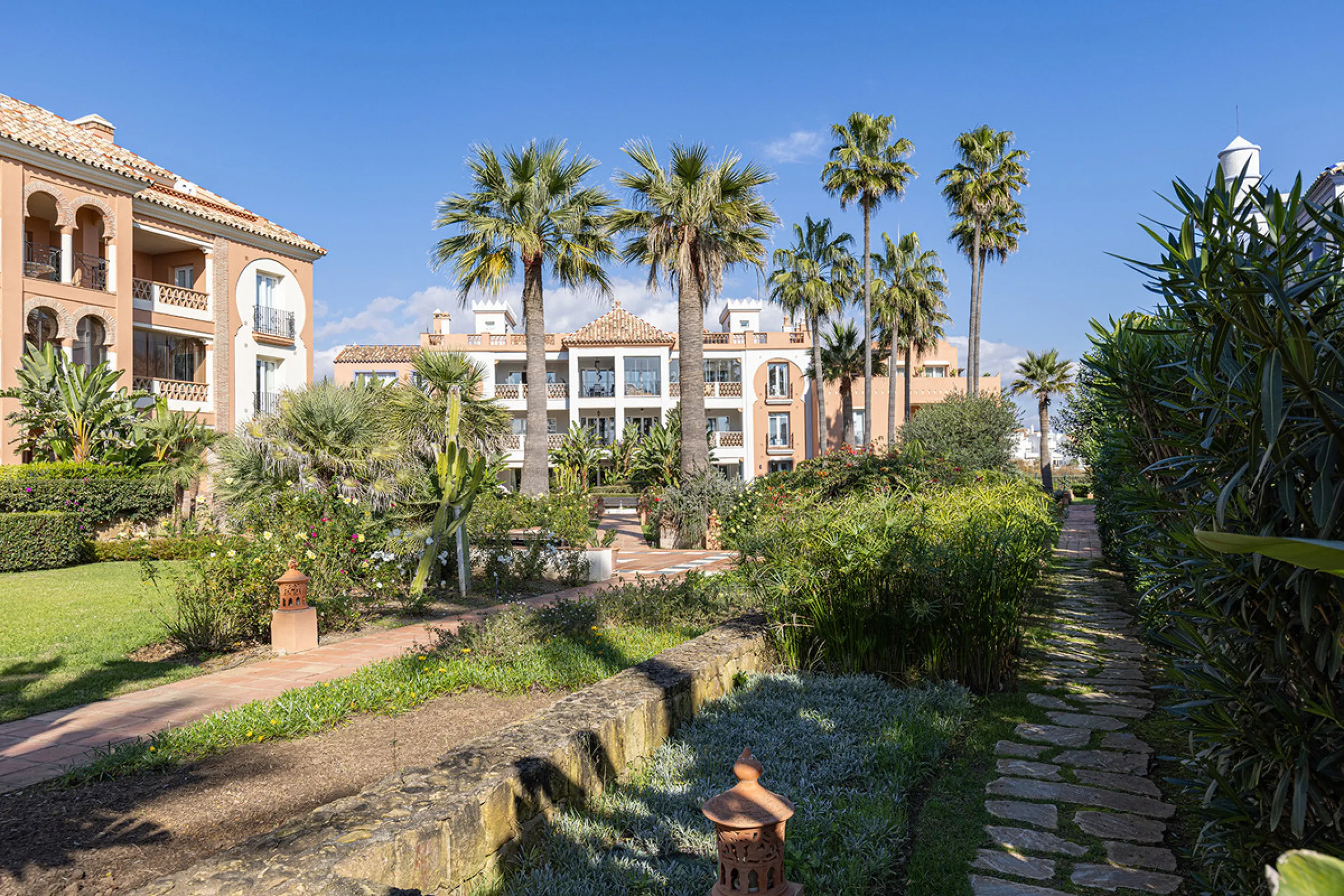 Wake up to breathtaking sea views from this exceptional 3-bedroom, 2-bathroom ground floor apartment set within one of the most prestigious frontline beach urbanisations in Casares Costa. With a spacious terrace overlooking beautifully landscaped gardens 