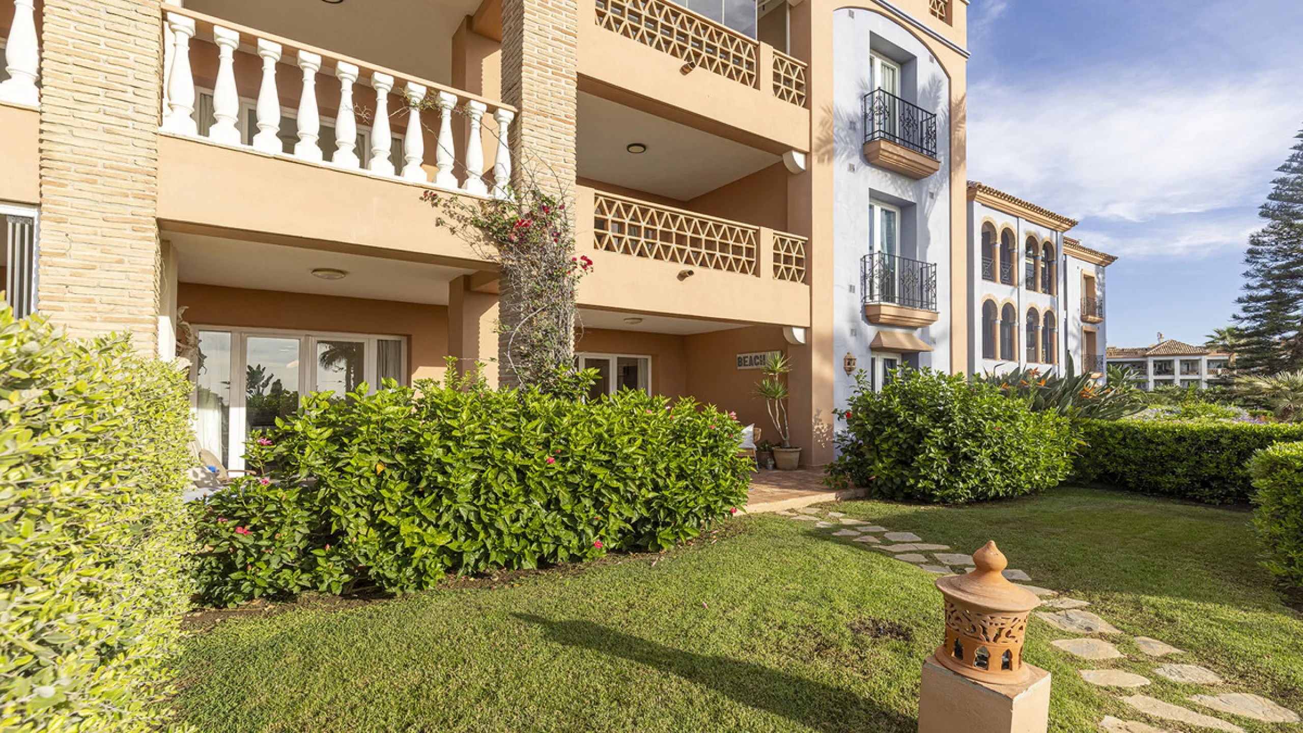 Wake up to breathtaking sea views from this exceptional 3-bedroom, 2-bathroom ground floor apartment set within one of the most prestigious frontline beach urbanisations in Casares Costa. With a spacious terrace overlooking beautifully landscaped gardens 