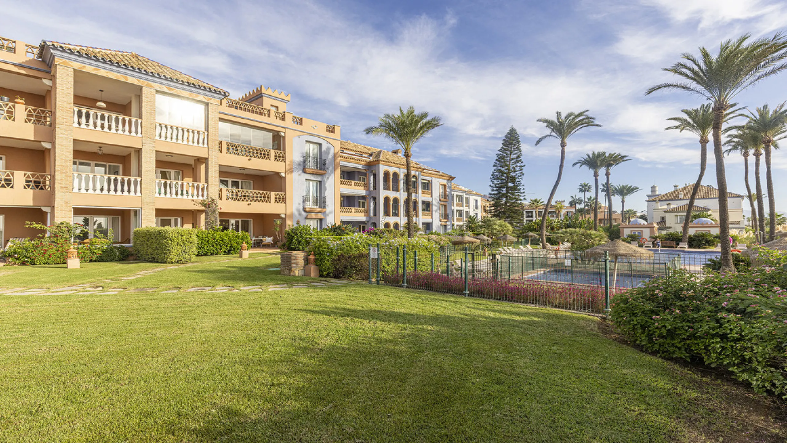 Wake up to breathtaking sea views from this exceptional 3-bedroom, 2-bathroom ground floor apartment set within one of the most prestigious frontline beach urbanisations in Casares Costa. With a spacious terrace overlooking beautifully landscaped gardens 