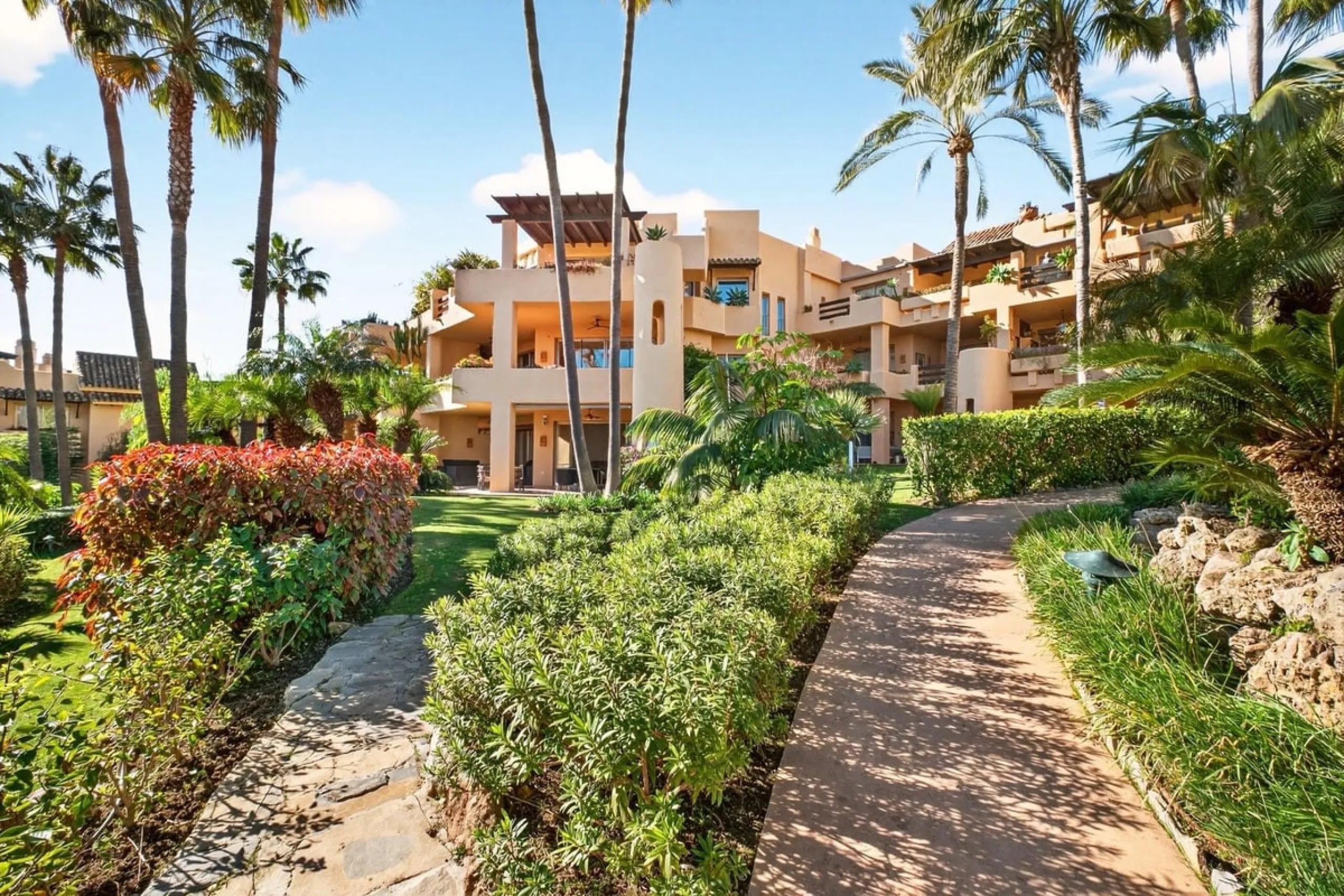This south-east facing garden apartment is located in the well-known gated community of Mansion Club, on Marbella's Golden Mile. The area is valued for its privacy, security, and convenient access to the beach, restaurants, shops, and some of Marbella's m