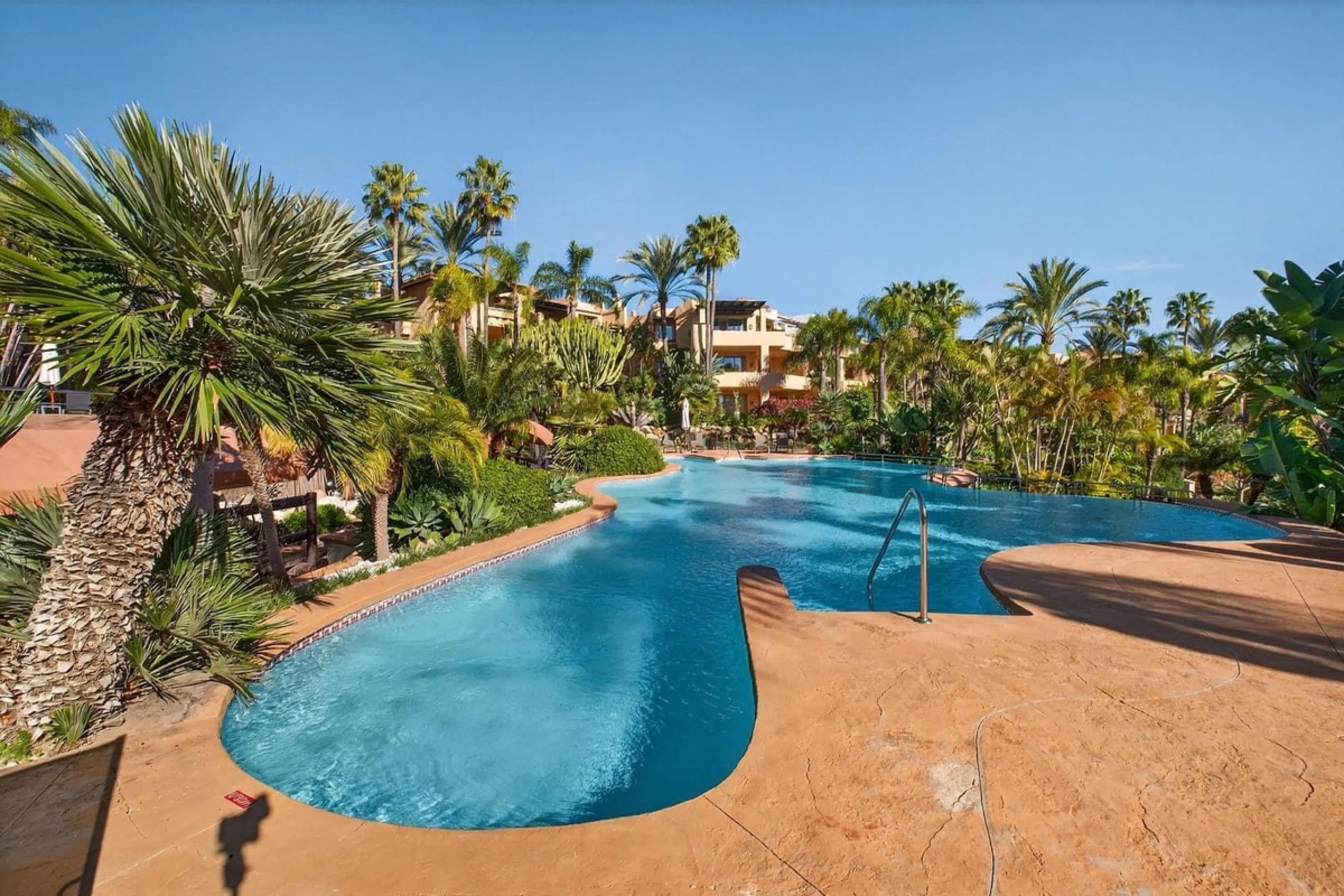This south-east facing garden apartment is located in the well-known gated community of Mansion Club, on Marbella's Golden Mile. The area is valued for its privacy, security, and convenient access to the beach, restaurants, shops, and some of Marbella's m