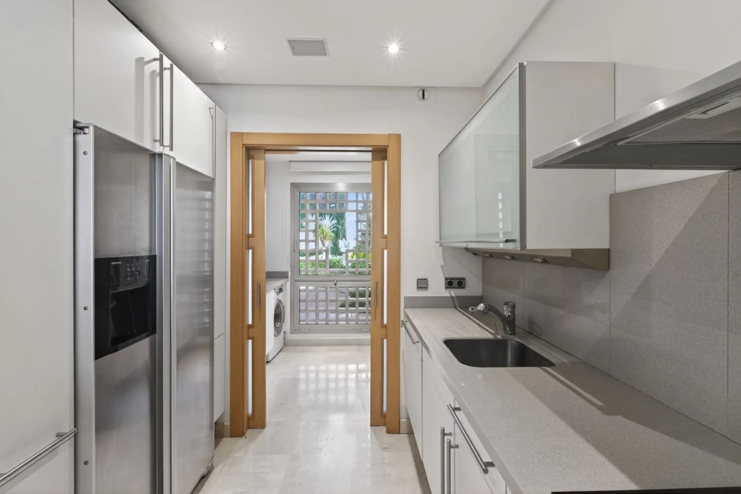 This south-east facing garden apartment is located in the well-known gated community of Mansion Club, on Marbella's Golden Mile. The area is valued for its privacy, security, and convenient access to the beach, restaurants, shops, and some of Marbella's m