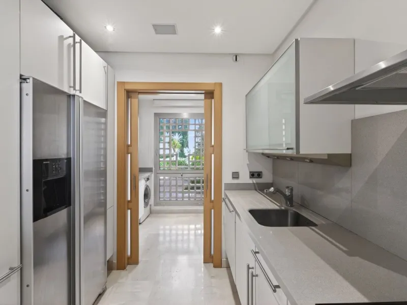This south-east facing garden apartment is located in the well-known gated community of Mansion Club, on Marbella's Golden Mile. The area is valued for its privacy, security, and convenient access to the beach, restaurants, shops, and some of Marbella's m