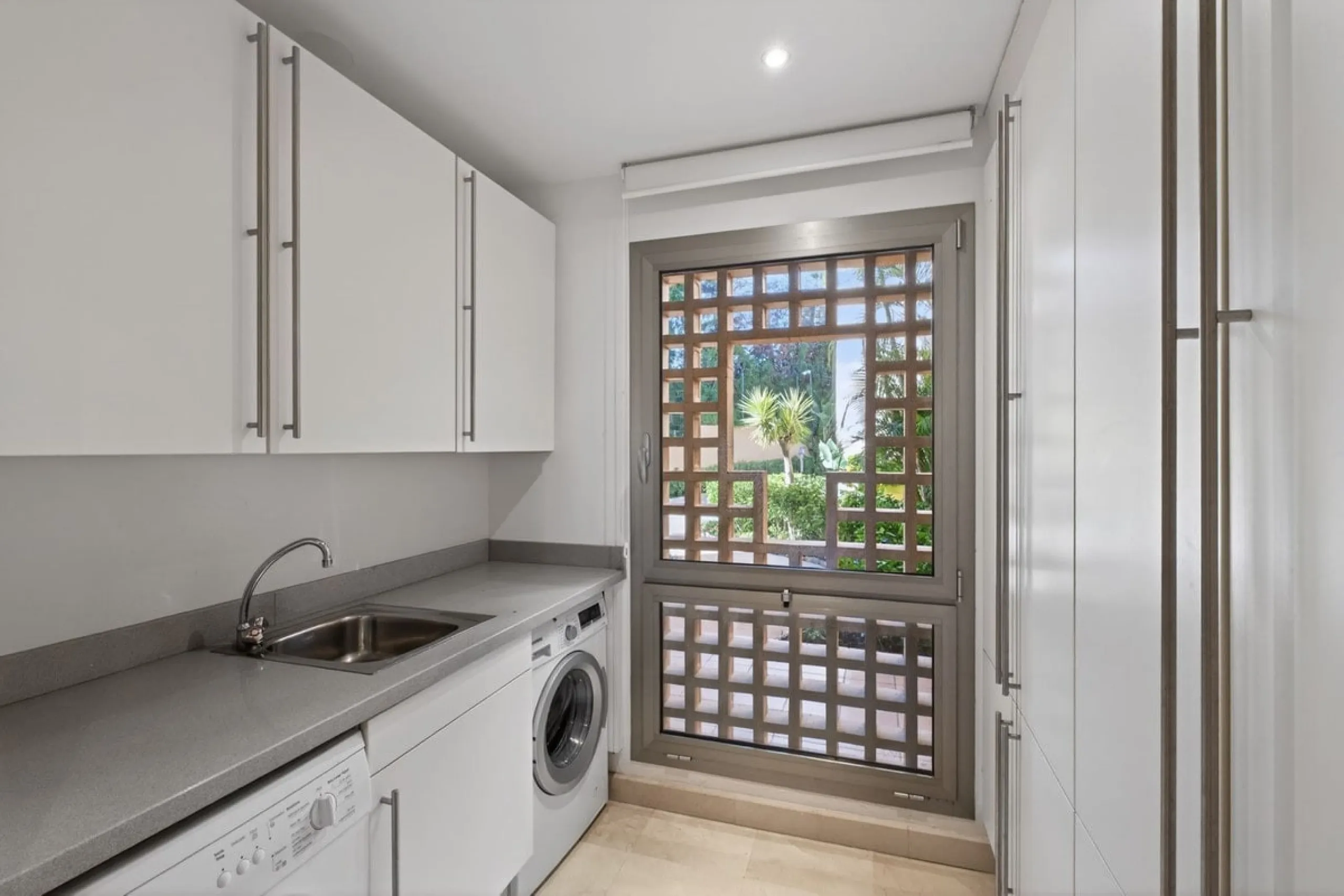 This south-east facing garden apartment is located in the well-known gated community of Mansion Club, on Marbella's Golden Mile. The area is valued for its privacy, security, and convenient access to the beach, restaurants, shops, and some of Marbella's m