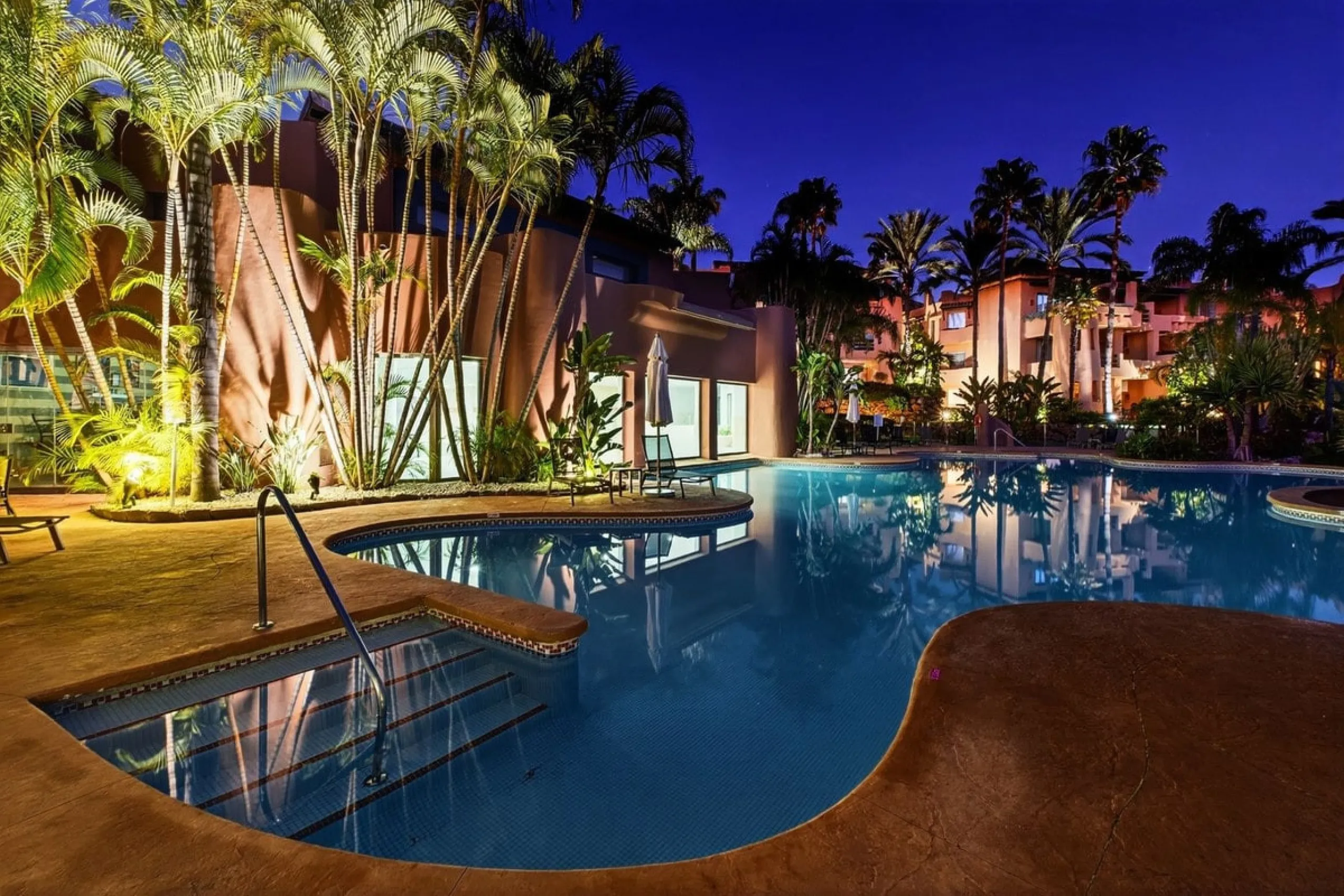 This south-east facing garden apartment is located in the well-known gated community of Mansion Club, on Marbella's Golden Mile. The area is valued for its privacy, security, and convenient access to the beach, restaurants, shops, and some of Marbella's m