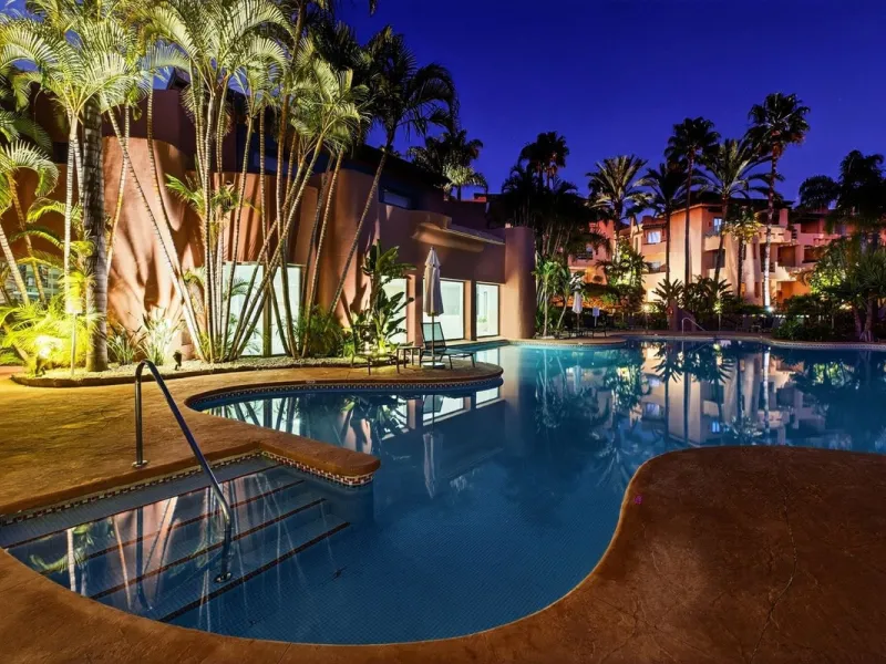 This south-east facing garden apartment is located in the well-known gated community of Mansion Club, on Marbella's Golden Mile. The area is valued for its privacy, security, and convenient access to the beach, restaurants, shops, and some of Marbella's m