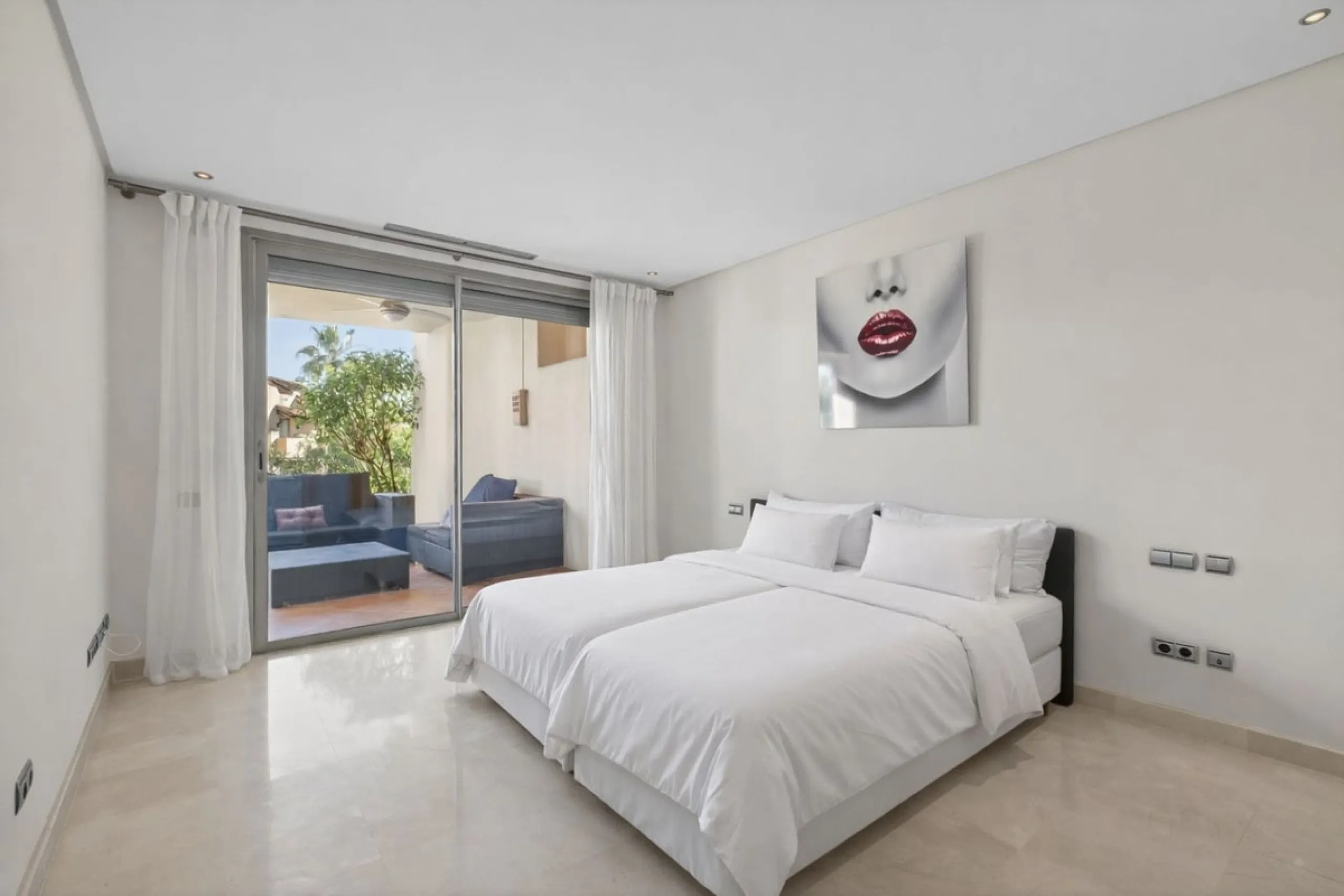 This south-east facing garden apartment is located in the well-known gated community of Mansion Club, on Marbella's Golden Mile. The area is valued for its privacy, security, and convenient access to the beach, restaurants, shops, and some of Marbella's m