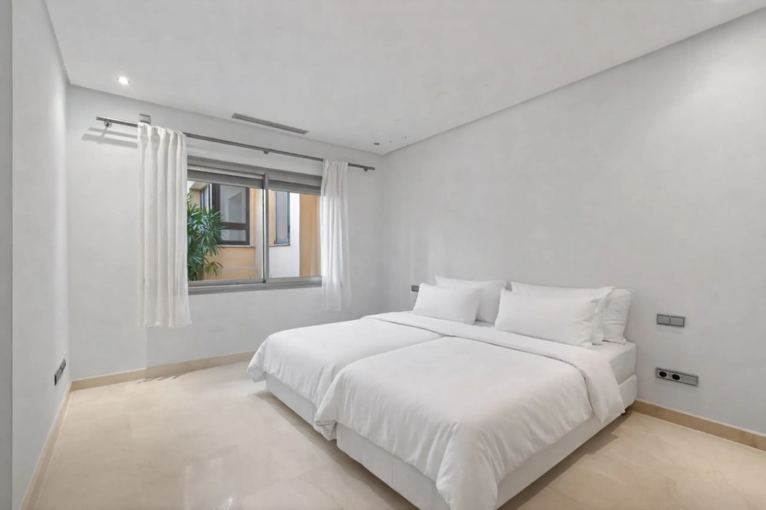 This south-east facing garden apartment is located in the well-known gated community of Mansion Club, on Marbella's Golden Mile. The area is valued for its privacy, security, and convenient access to the beach, restaurants, shops, and some of Marbella's m