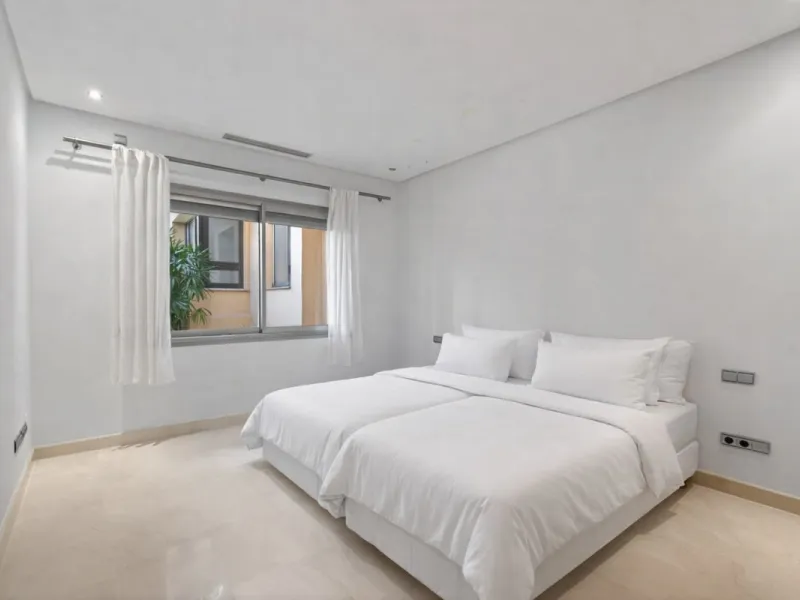 This south-east facing garden apartment is located in the well-known gated community of Mansion Club, on Marbella's Golden Mile. The area is valued for its privacy, security, and convenient access to the beach, restaurants, shops, and some of Marbella's m