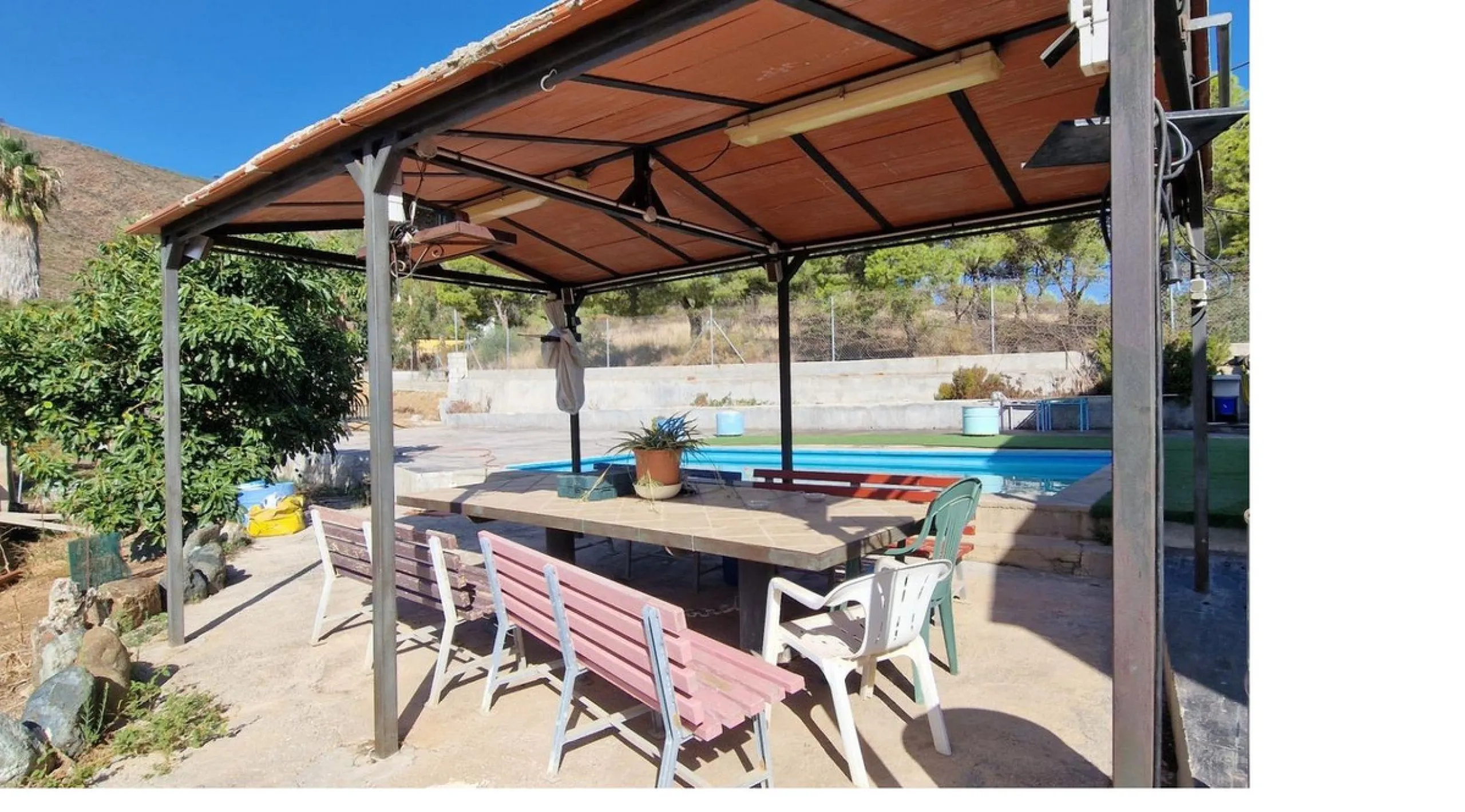 Nestled beside a protected natural reserve, this charming rustic property offers privacy, space, and breathtaking panoramic views of the surrounding mountains and from the top terrace you even have seaviews. A perfect blend of countryside tranquility and 