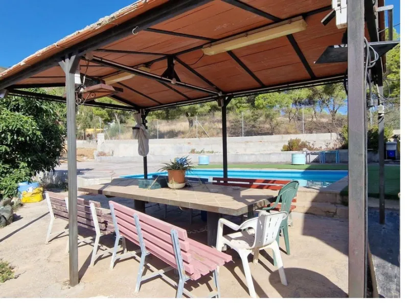 Nestled beside a protected natural reserve, this charming rustic property offers privacy, space, and breathtaking panoramic views of the surrounding mountains and from the top terrace you even have seaviews. A perfect blend of countryside tranquility and 