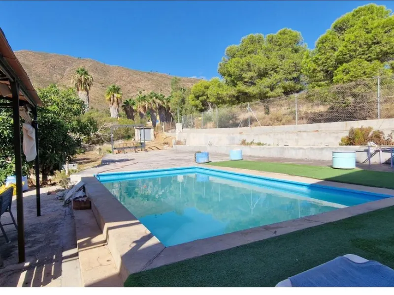 Nestled beside a protected natural reserve, this charming rustic property offers privacy, space, and breathtaking panoramic views of the surrounding mountains and from the top terrace you even have seaviews. A perfect blend of countryside tranquility and 