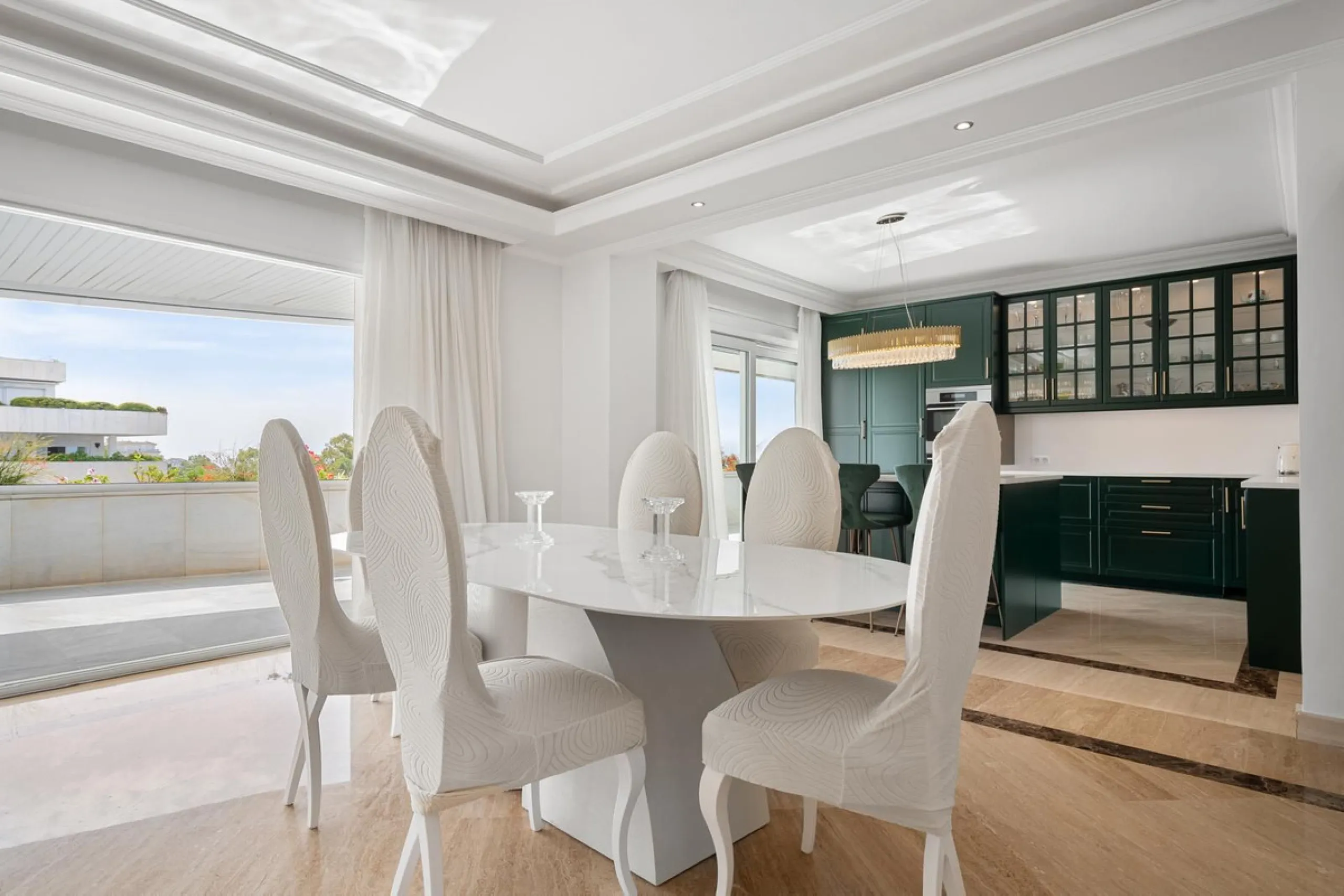 Available for short-term stays, this impressive top-floor apartment offers a rare combination of space, comfort, and security within an exclusive gated complex. With three bedrooms and five bathrooms, the property is perfectly suited for families or group