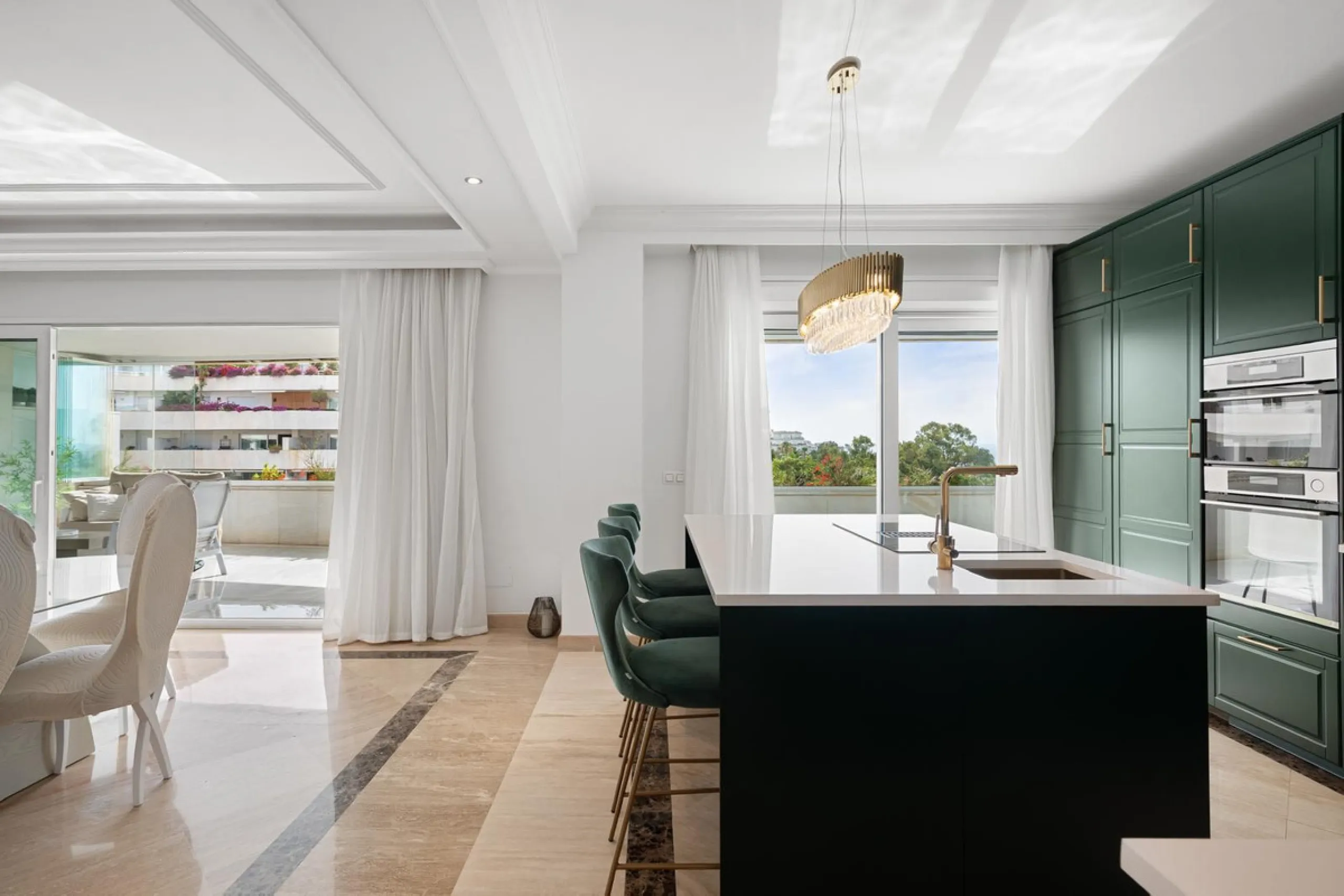 Available for short-term stays, this impressive top-floor apartment offers a rare combination of space, comfort, and security within an exclusive gated complex. With three bedrooms and five bathrooms, the property is perfectly suited for families or group