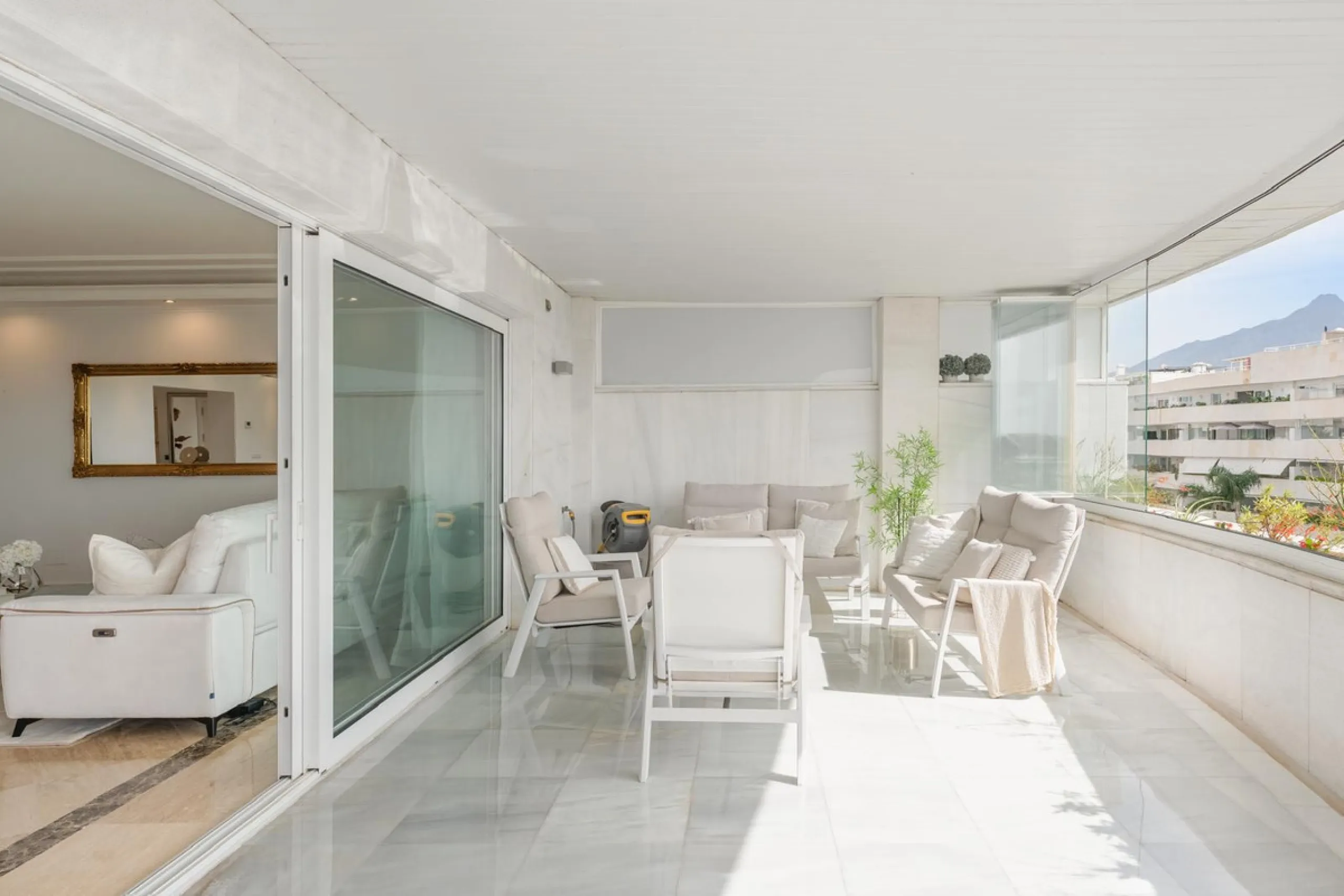 Available for short-term stays, this impressive top-floor apartment offers a rare combination of space, comfort, and security within an exclusive gated complex. With three bedrooms and five bathrooms, the property is perfectly suited for families or group