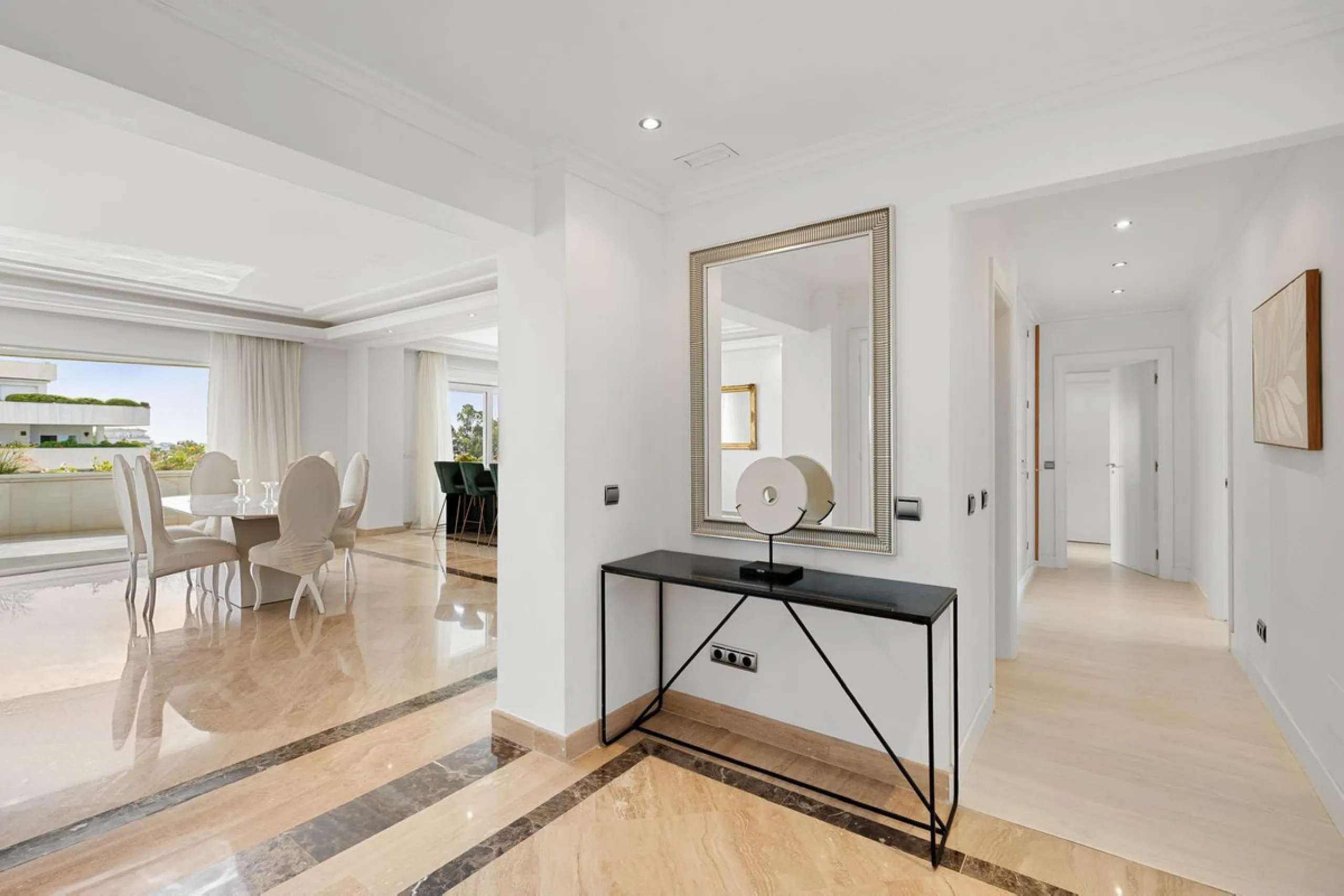 Available for short-term stays, this impressive top-floor apartment offers a rare combination of space, comfort, and security within an exclusive gated complex. With three bedrooms and five bathrooms, the property is perfectly suited for families or group