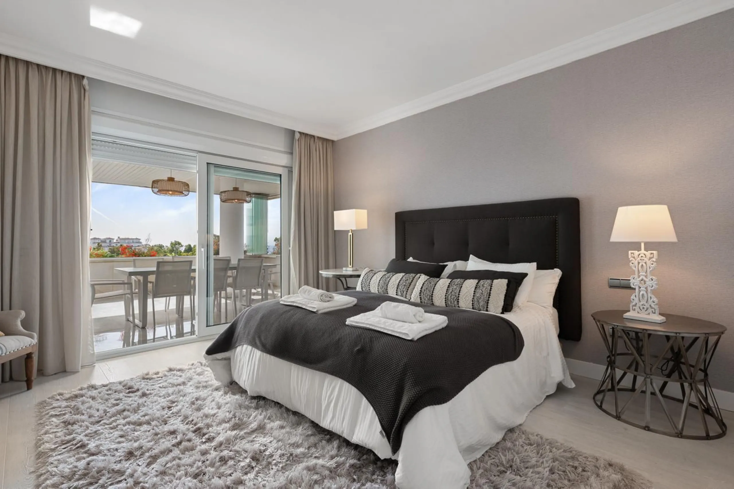 Available for short-term stays, this impressive top-floor apartment offers a rare combination of space, comfort, and security within an exclusive gated complex. With three bedrooms and five bathrooms, the property is perfectly suited for families or group