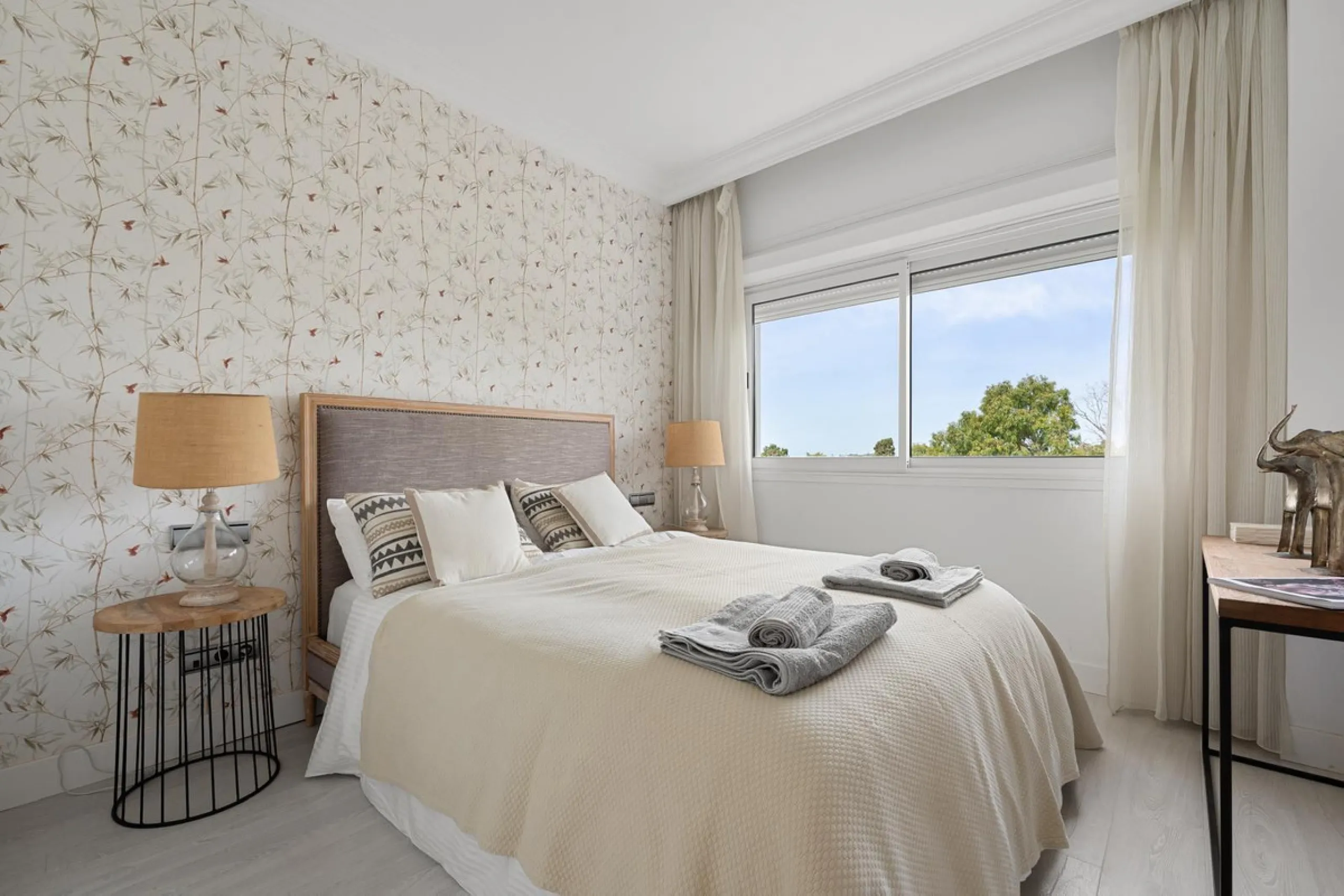 Available for short-term stays, this impressive top-floor apartment offers a rare combination of space, comfort, and security within an exclusive gated complex. With three bedrooms and five bathrooms, the property is perfectly suited for families or group