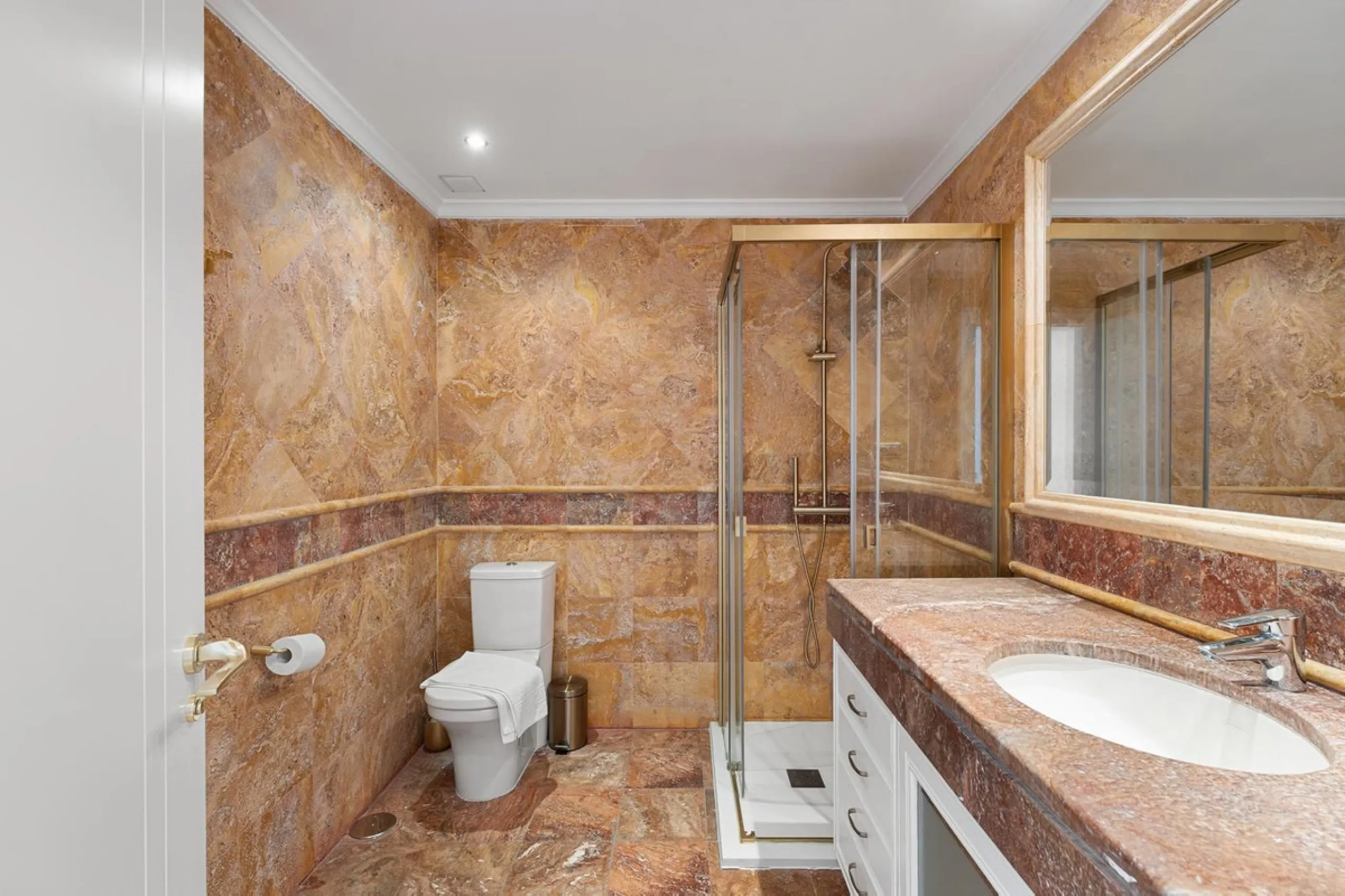 Available for short-term stays, this impressive top-floor apartment offers a rare combination of space, comfort, and security within an exclusive gated complex. With three bedrooms and five bathrooms, the property is perfectly suited for families or group