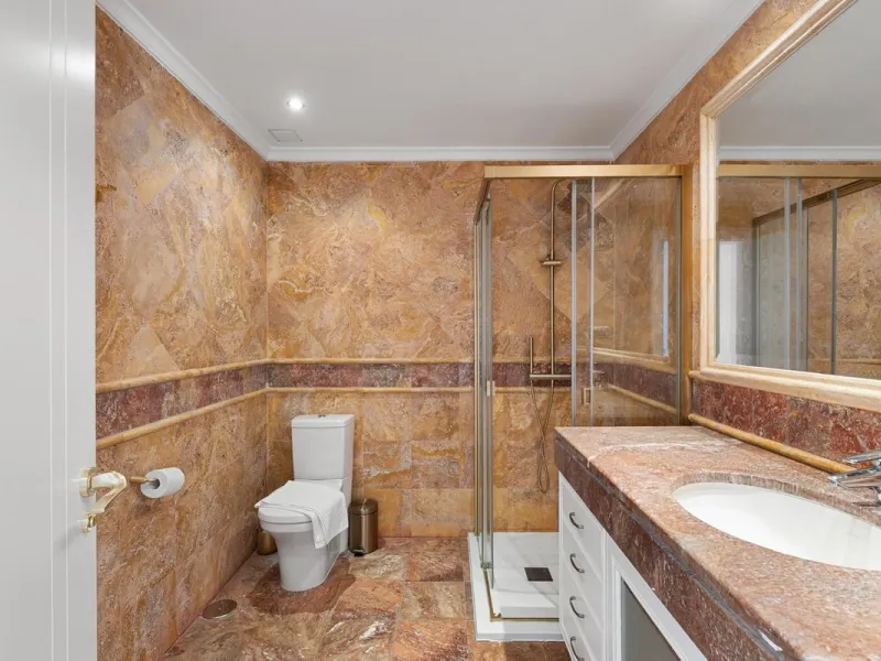 Available for short-term stays, this impressive top-floor apartment offers a rare combination of space, comfort, and security within an exclusive gated complex. With three bedrooms and five bathrooms, the property is perfectly suited for families or group