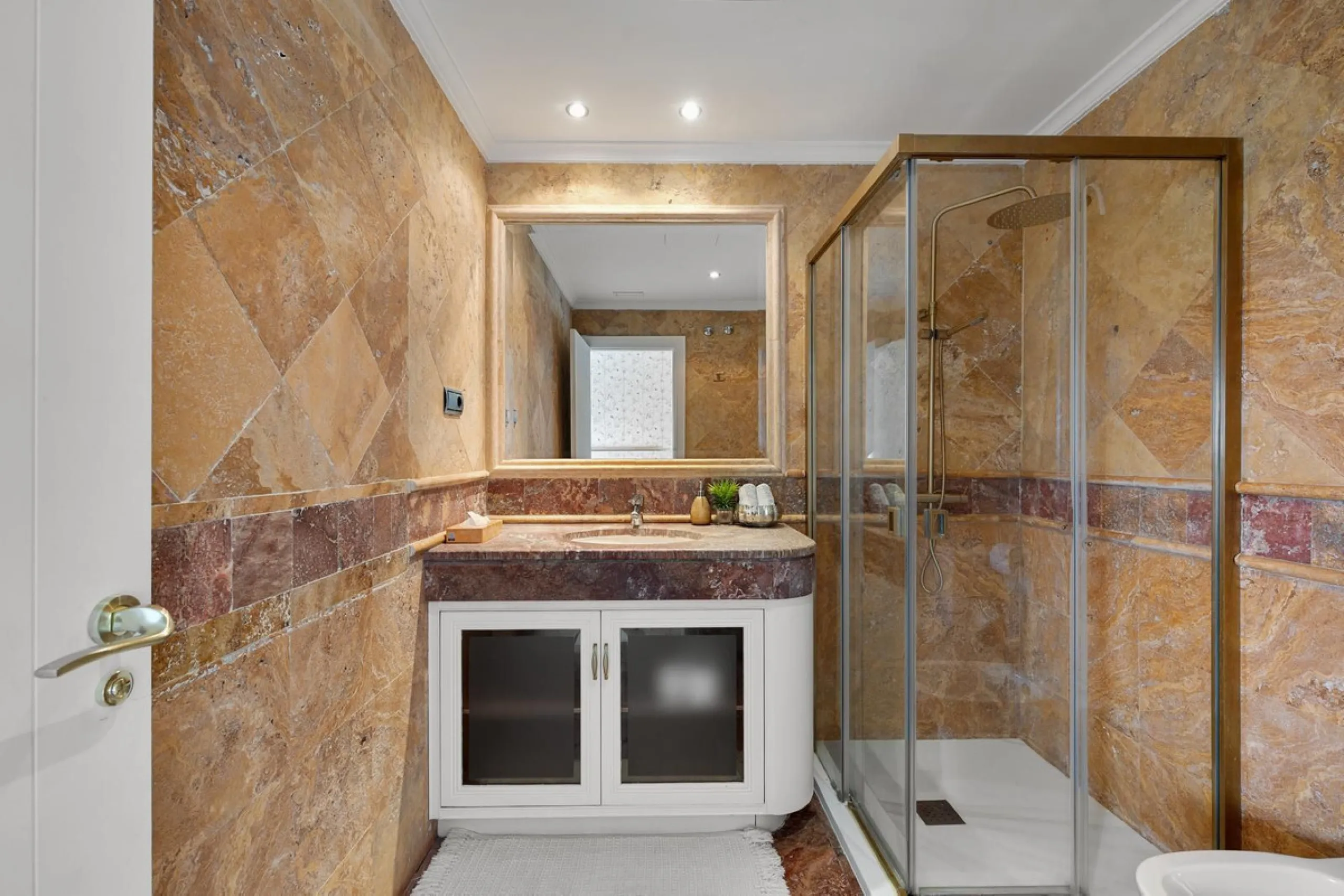 Available for short-term stays, this impressive top-floor apartment offers a rare combination of space, comfort, and security within an exclusive gated complex. With three bedrooms and five bathrooms, the property is perfectly suited for families or group