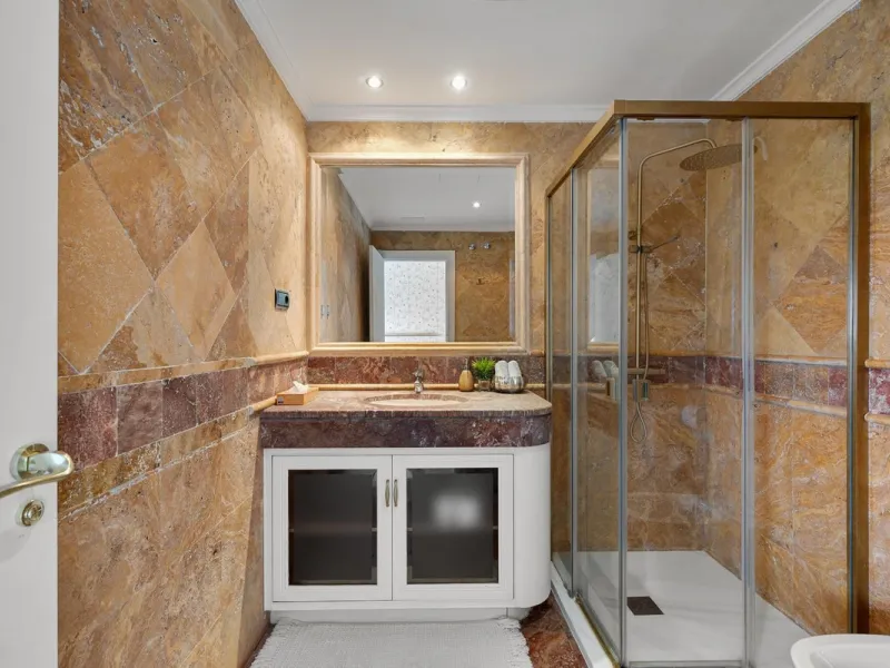 Available for short-term stays, this impressive top-floor apartment offers a rare combination of space, comfort, and security within an exclusive gated complex. With three bedrooms and five bathrooms, the property is perfectly suited for families or group