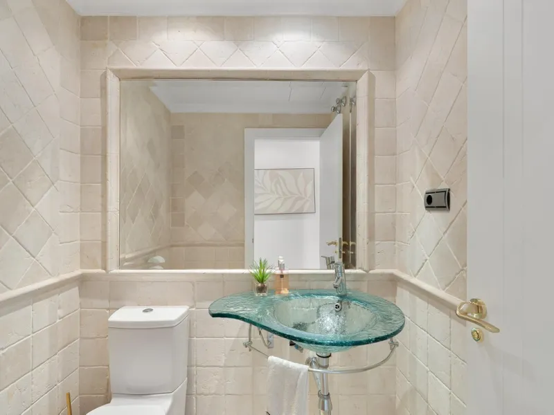 Available for short-term stays, this impressive top-floor apartment offers a rare combination of space, comfort, and security within an exclusive gated complex. With three bedrooms and five bathrooms, the property is perfectly suited for families or group