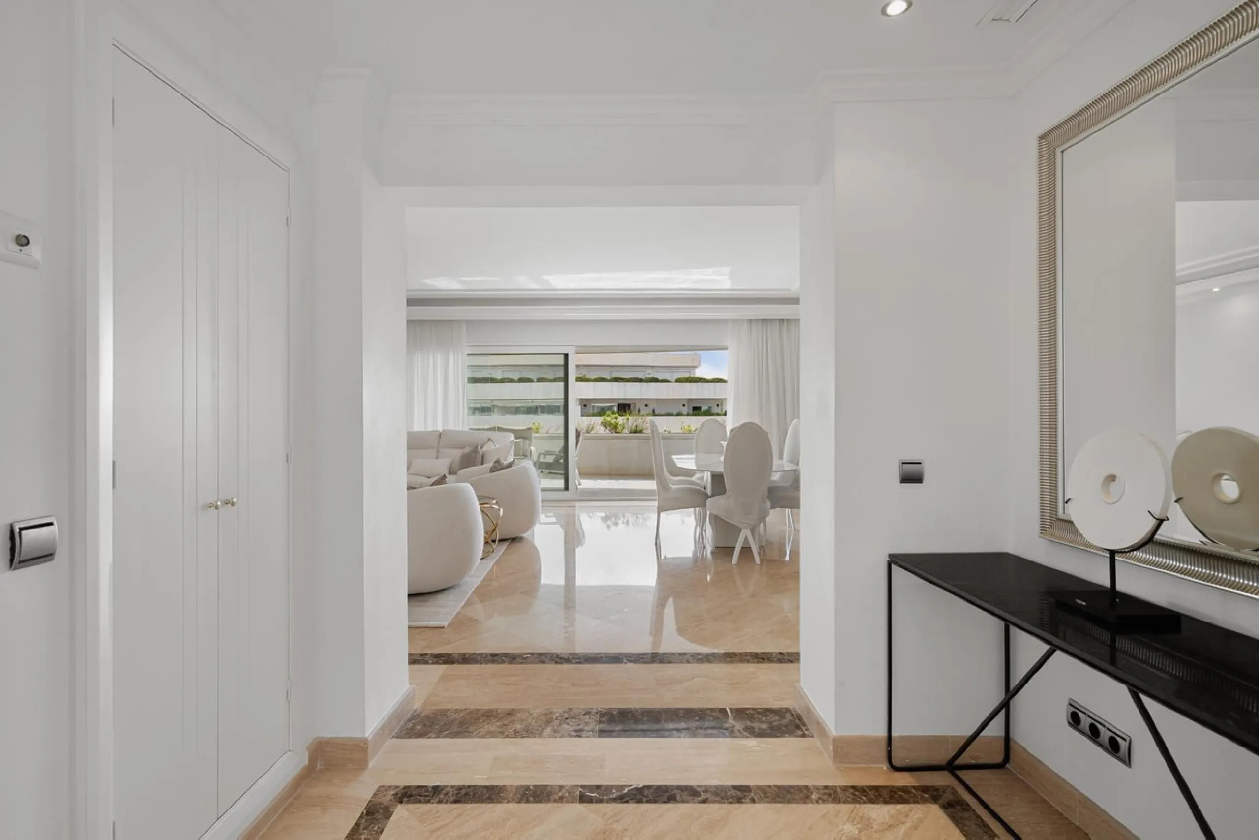 Available for short-term stays, this impressive top-floor apartment offers a rare combination of space, comfort, and security within an exclusive gated complex. With three bedrooms and five bathrooms, the property is perfectly suited for families or group