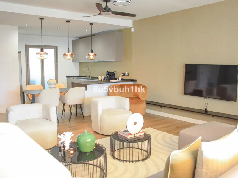 Experience the perfect harmony of luxury, comfort, and stunning panoramic views in this exceptional duplex penthouse, completely renovated and located on Marbella's prestigious Golden Mile.